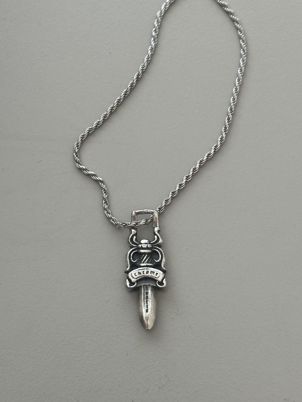 CHROME HEARTS TINY DAGGER PENDANT main image 1
