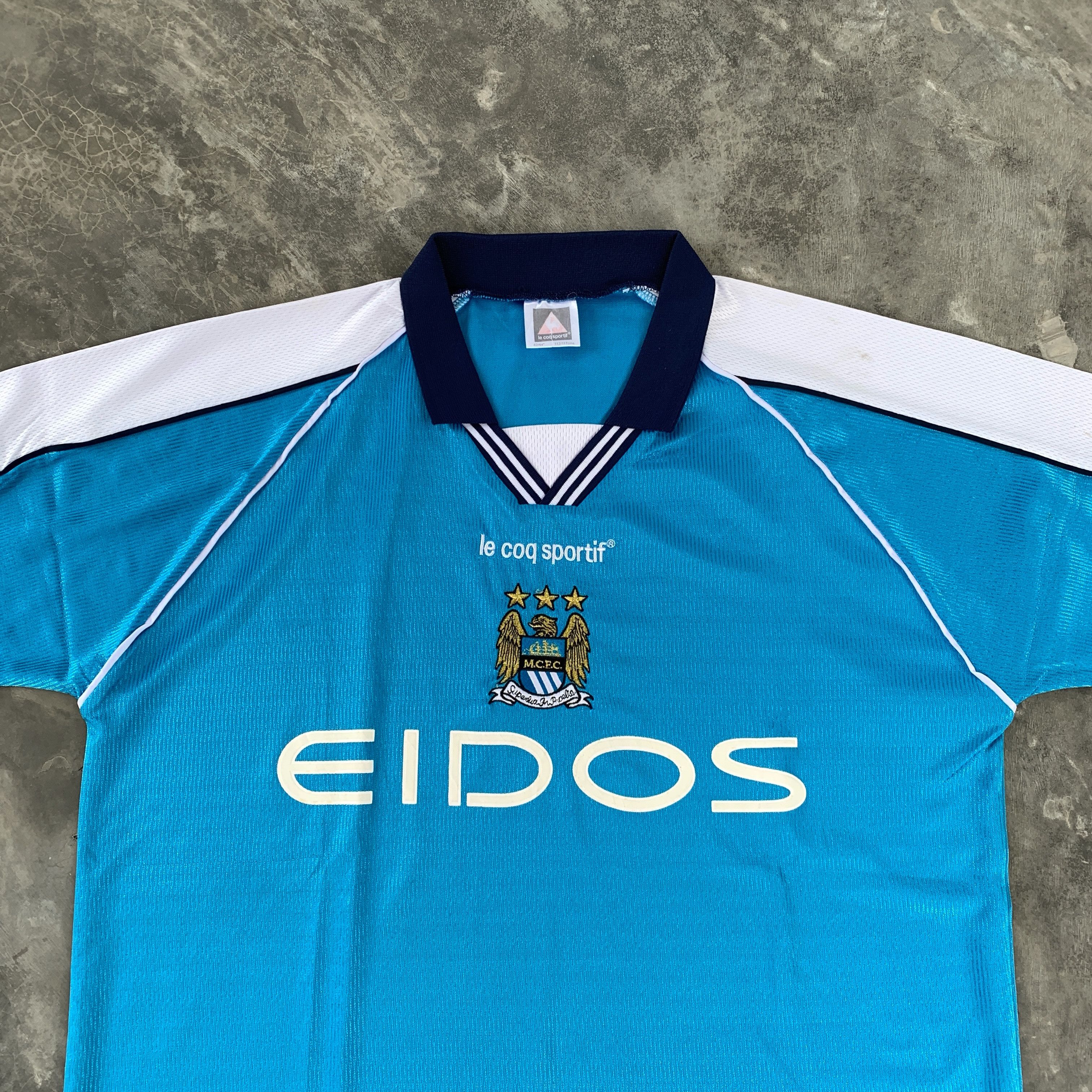 Le Coq Sportif VINTAGE LE COQ SPORTIF MANCHESTER CITY 1999-2001 HOME JERSEY Size US L / EU 52-54 / 3 - 2 Thumbnail