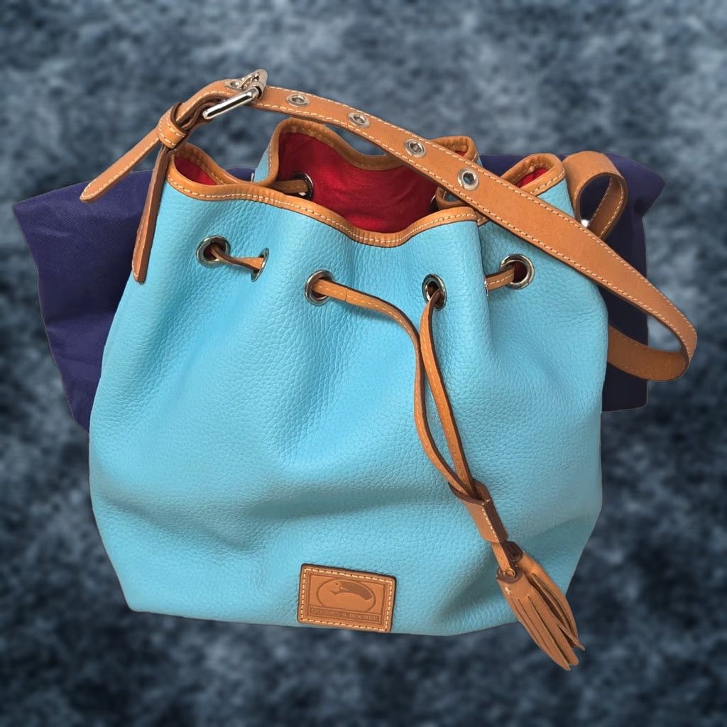 Dooney & Bourke Dooney & Bourke All Weather Leather Drawstring Bucket Bag Turquoise Dust Bag Turquoise Pebble Grain Leather Bucket & Drawstring Bag Womens Size ONE SIZE - 1 Thumbnail