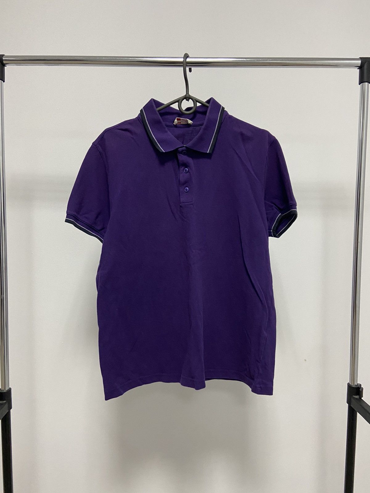 Prada Polo with iconic red rubber logo | Grailed