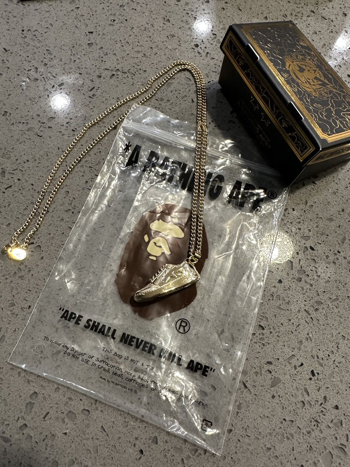 image of Bape Sta Gold Colored Shoe Necklace, Men's