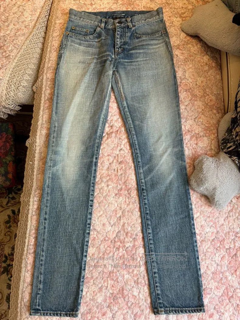 YSL Saint Laurent Blue Distressed Jeans.