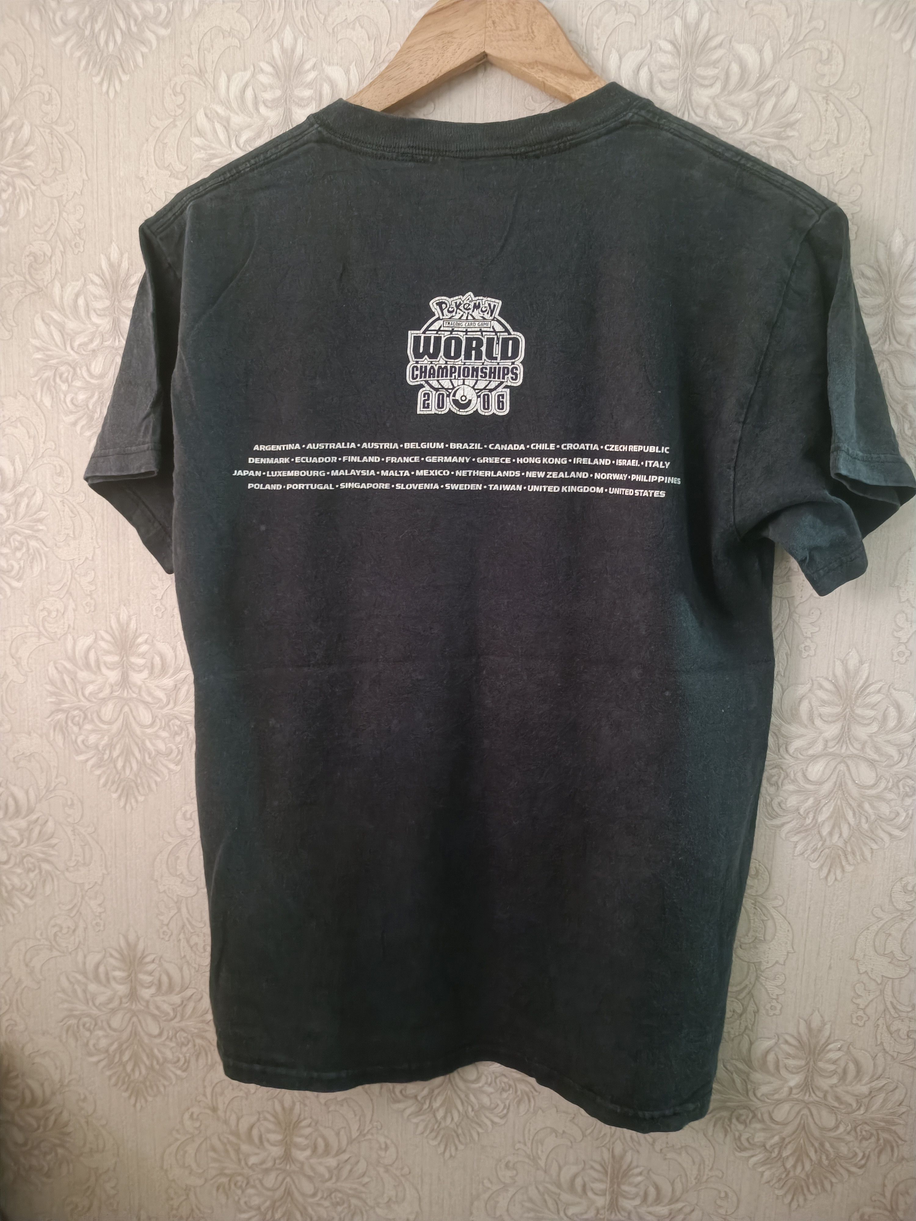 Pokemon ♦️Vintage Pokemon Trading Card Game World Champion 2006 Tee Size US S / EU 44-46 / 1 - 2 Thumbnail