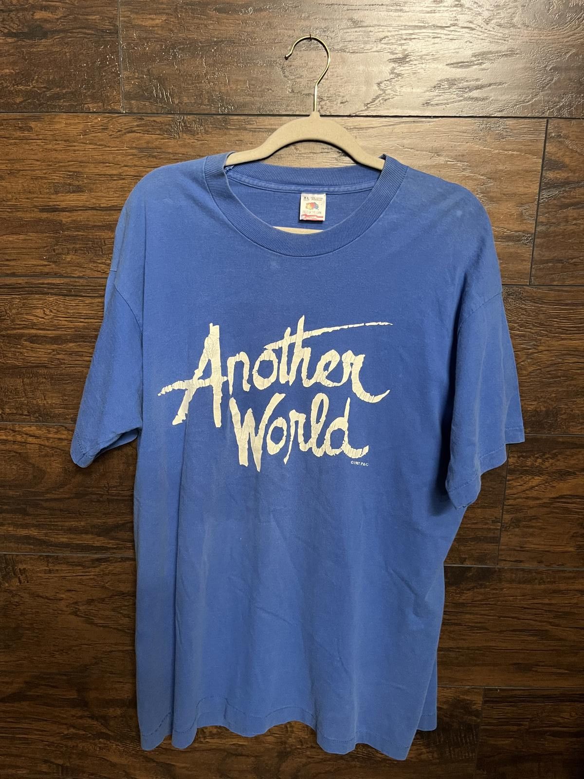 Designer Vintage Another World T-shirt 1987 - Single Stitch - XL Size US XL / EU 56 / 4 - 1 Thumbnail