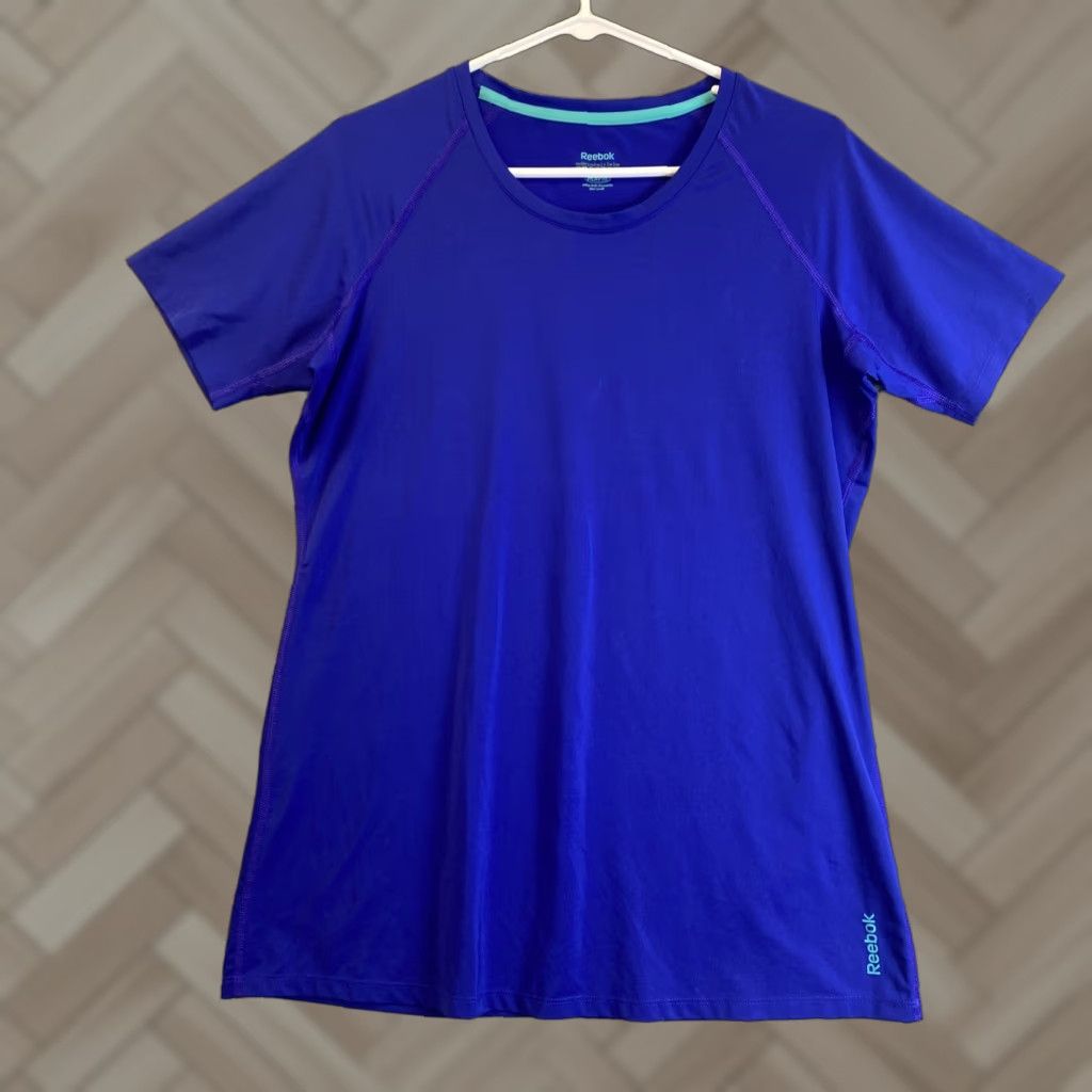 Reebok VINTAGE? No. Reebok Women’s Blue Short Sleeve T Shirt XL Regular Crew Neck Breathable Lightweight Logo 96% Polyester 4% Spandex Casual Sports 69-17 Size XL / US 12-14 / IT 48-50 - 1 Thumbnail