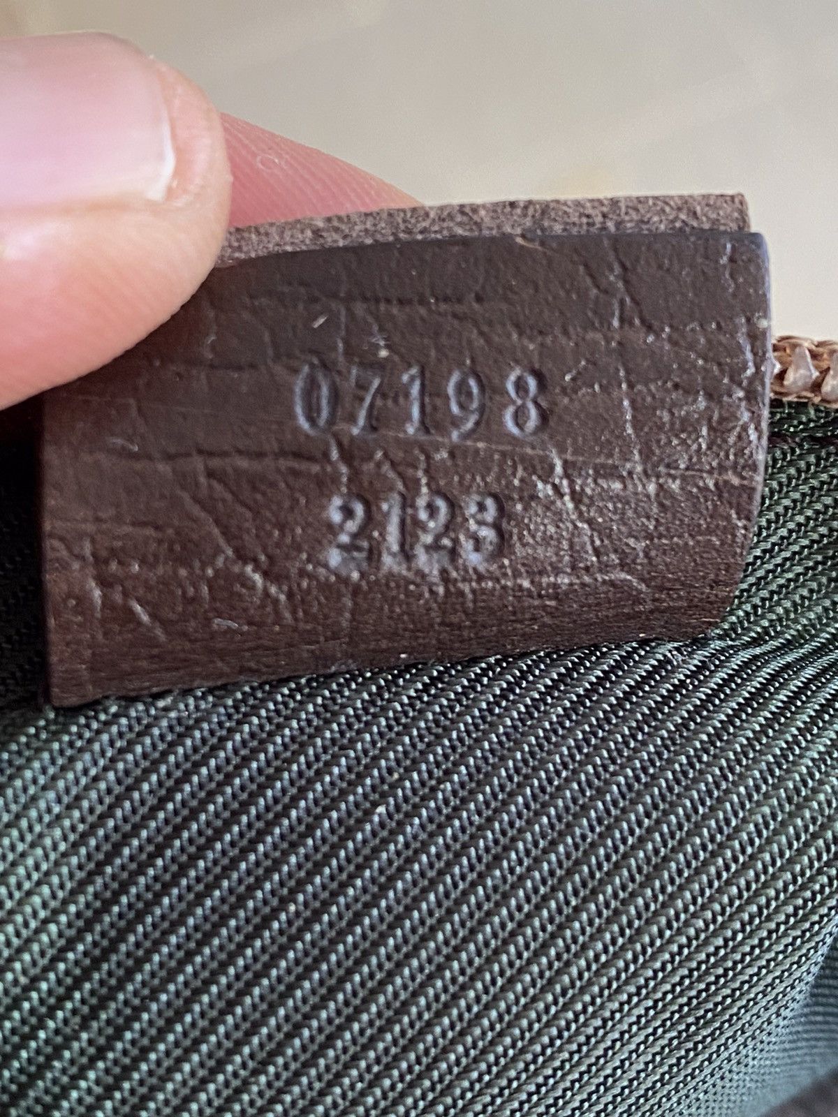 Gucci mini pochette monogram bag