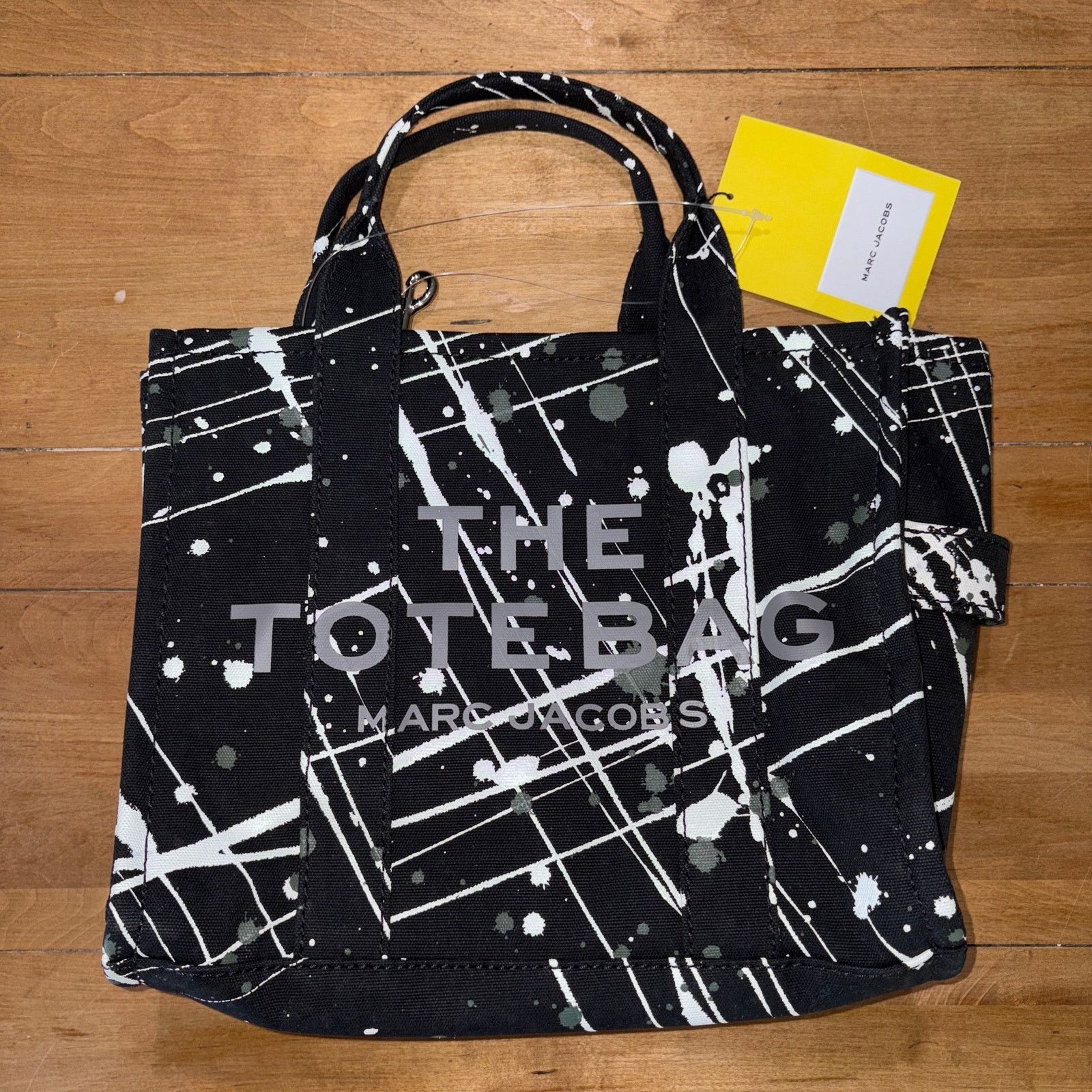 Marc Jacobs Marc Jacobs Canvas Splatter Medium The Tote Bag Black NWT Size ONE SIZE - 1 Thumbnail