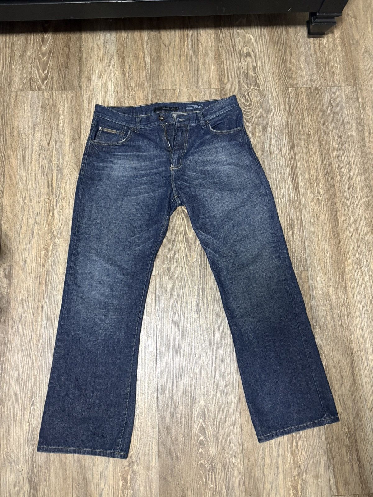Calvin Klein Calvin Klein faded indigo Slim Bootcut Jeans Size US 34 / EU 50 - 1 Thumbnail