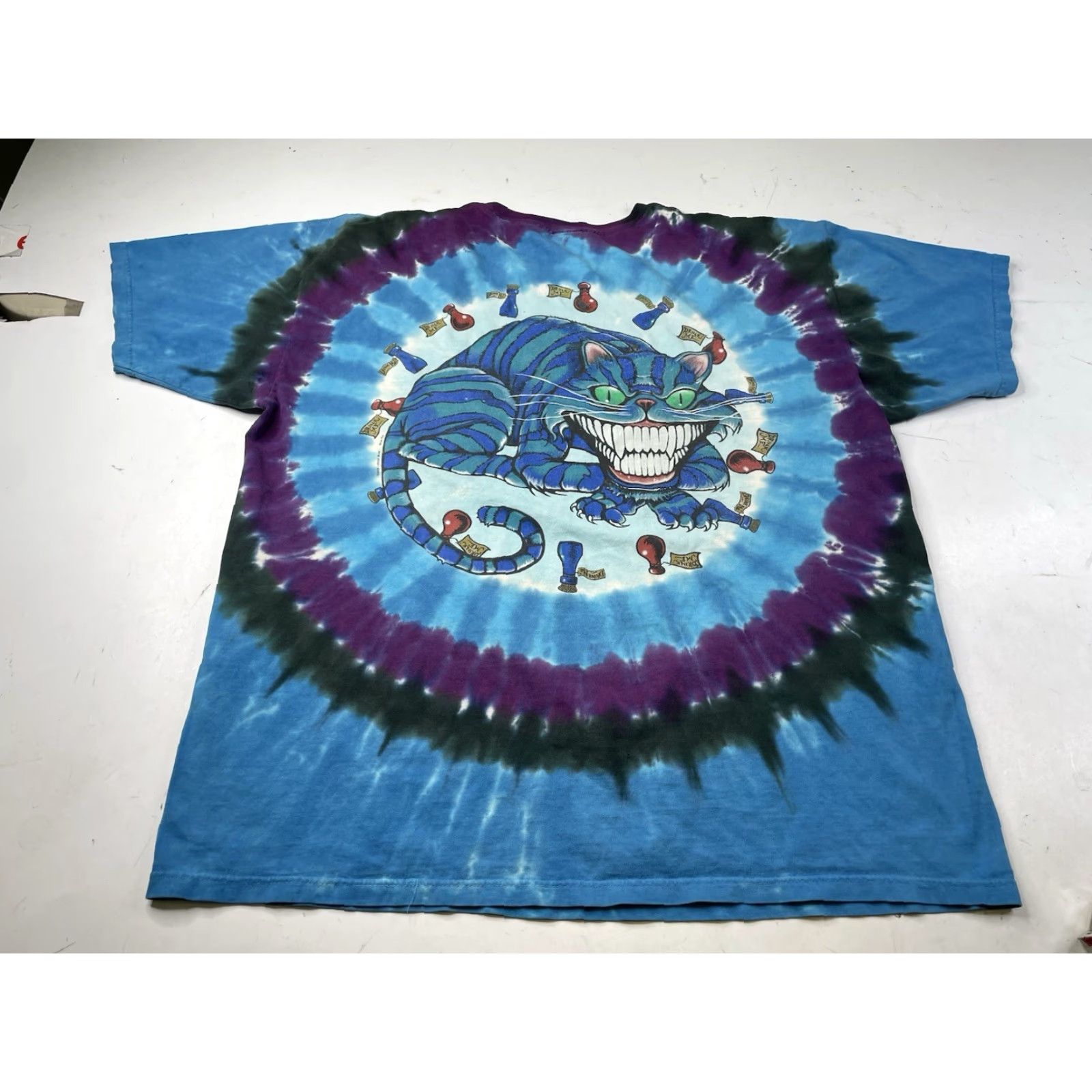 Liquid Blue VINTAGE 2003 Mad Hatter Cat Liquid Blue Tie Dye T-Shirt Mens XXL Blue Cat T-Shirt 2XL Mens Size US XXL / EU 58 / 5 - 7 Thumbnail