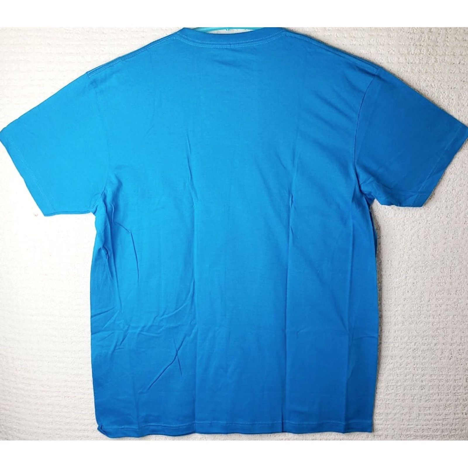 Vintage Tony Hawk T-Shirt Mens XL Blue Short Sleeve Crew Neck California Likes To Party Bear Logo Saying Graphic Print Jersey Solid Size US XL / EU 56 / 4 - 5 Thumbnail