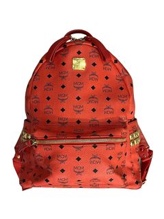 Red mcm backpack hot sale with studs