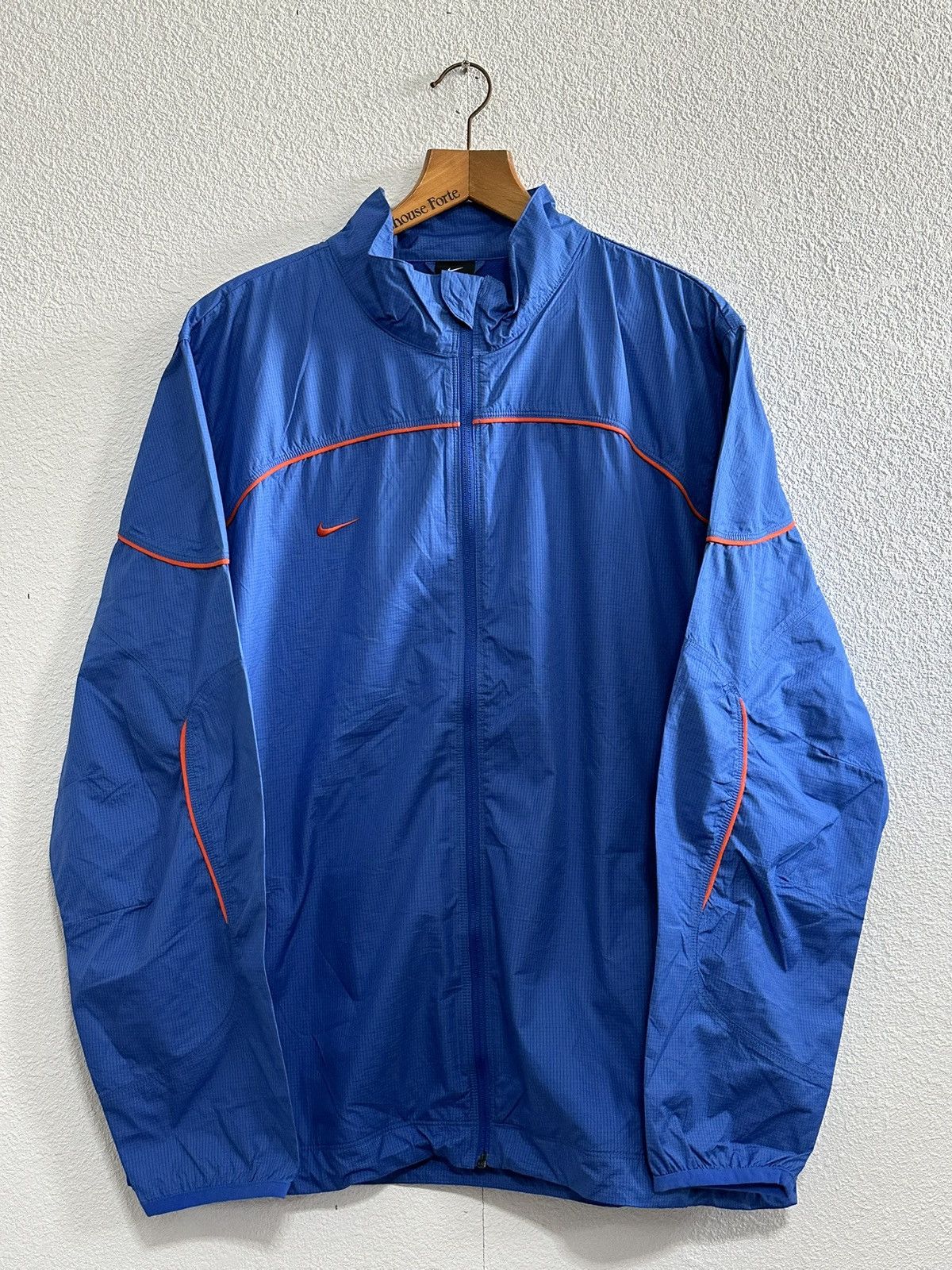 Nike Streetwear Vintage 2009 Nike windbreaker Blue Orange Grailed