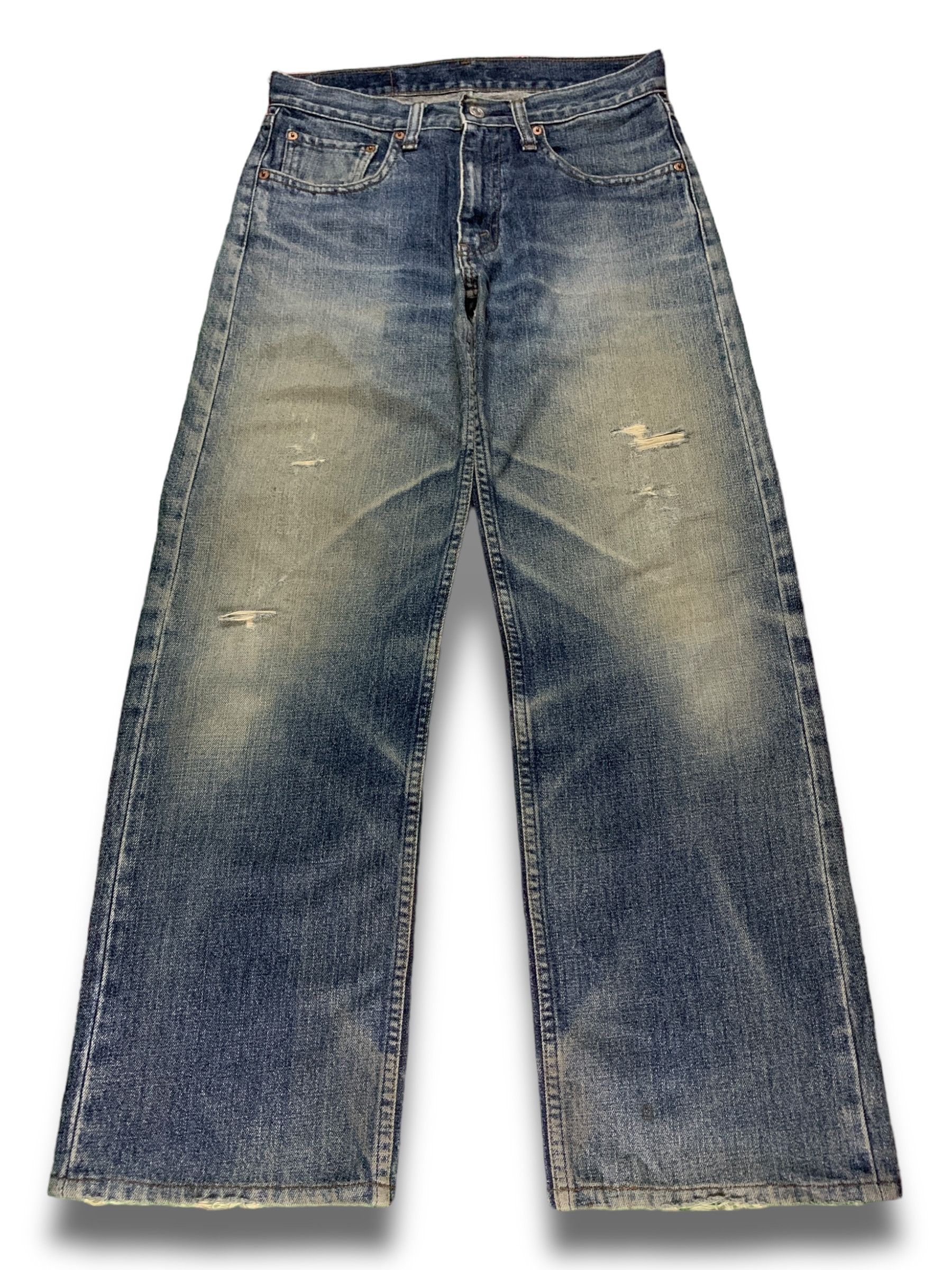image of Distressed Denim x Levis Vintage 90's Levis 534 Blue Wash Distressed Rip Baggy Jeans, Men's (Size 3