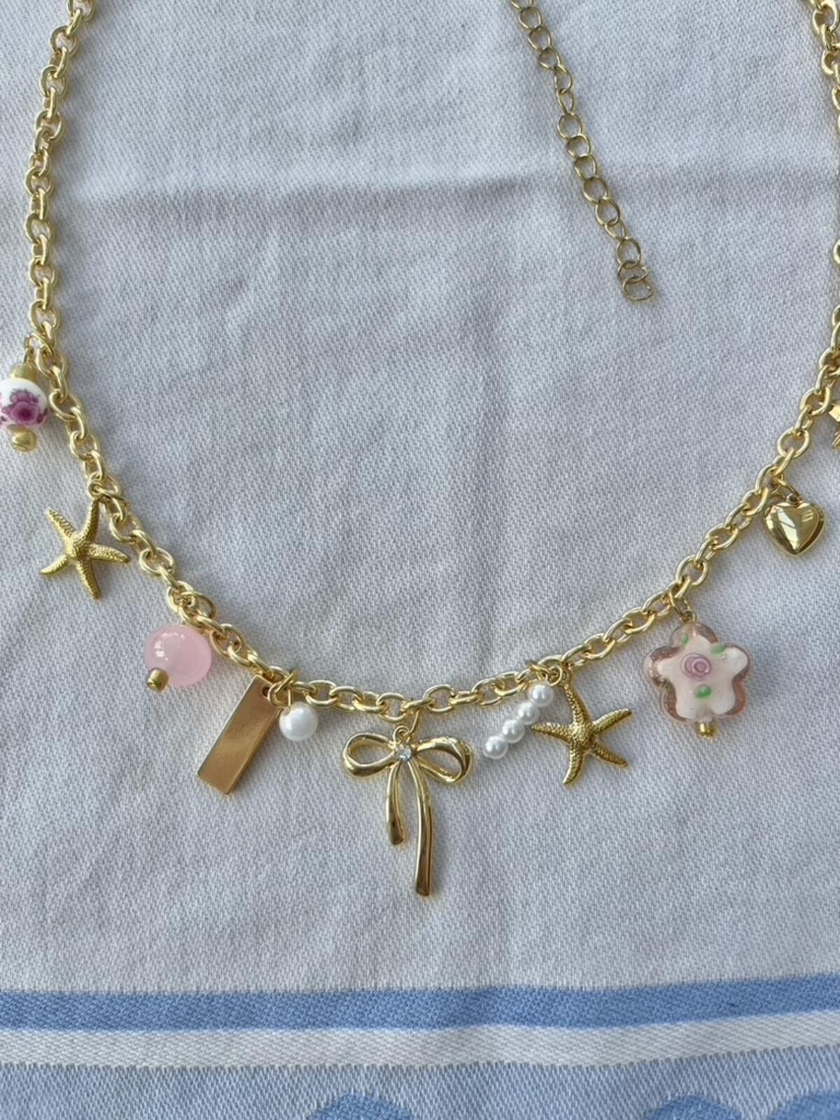 Other Gold plated pink beaded bow starfish charm pendant necklace Size ONE SIZE - 2 Thumbnail