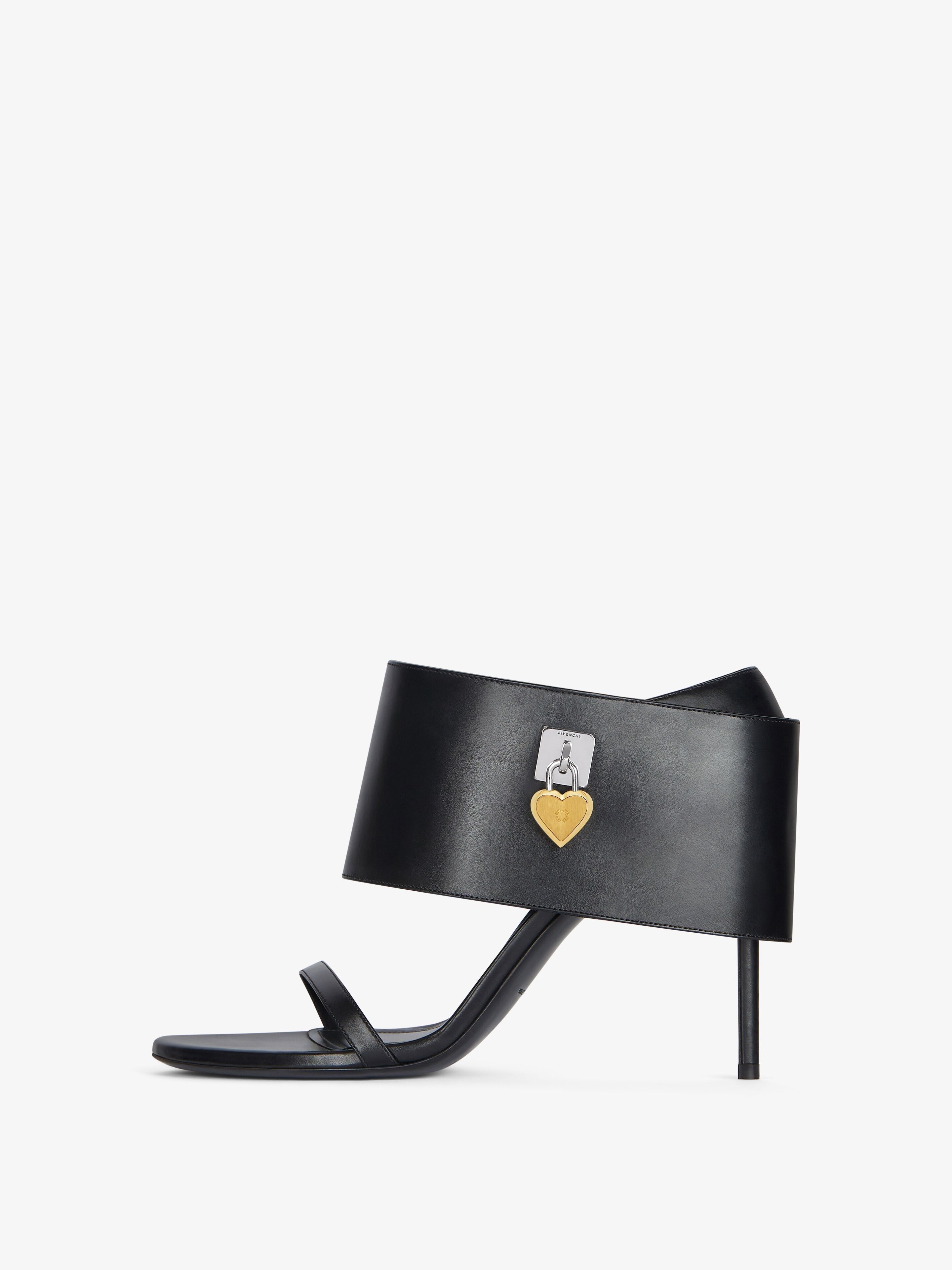 o1srvl11e0825 Shark Lock Heart Heeled Sandals in Black
