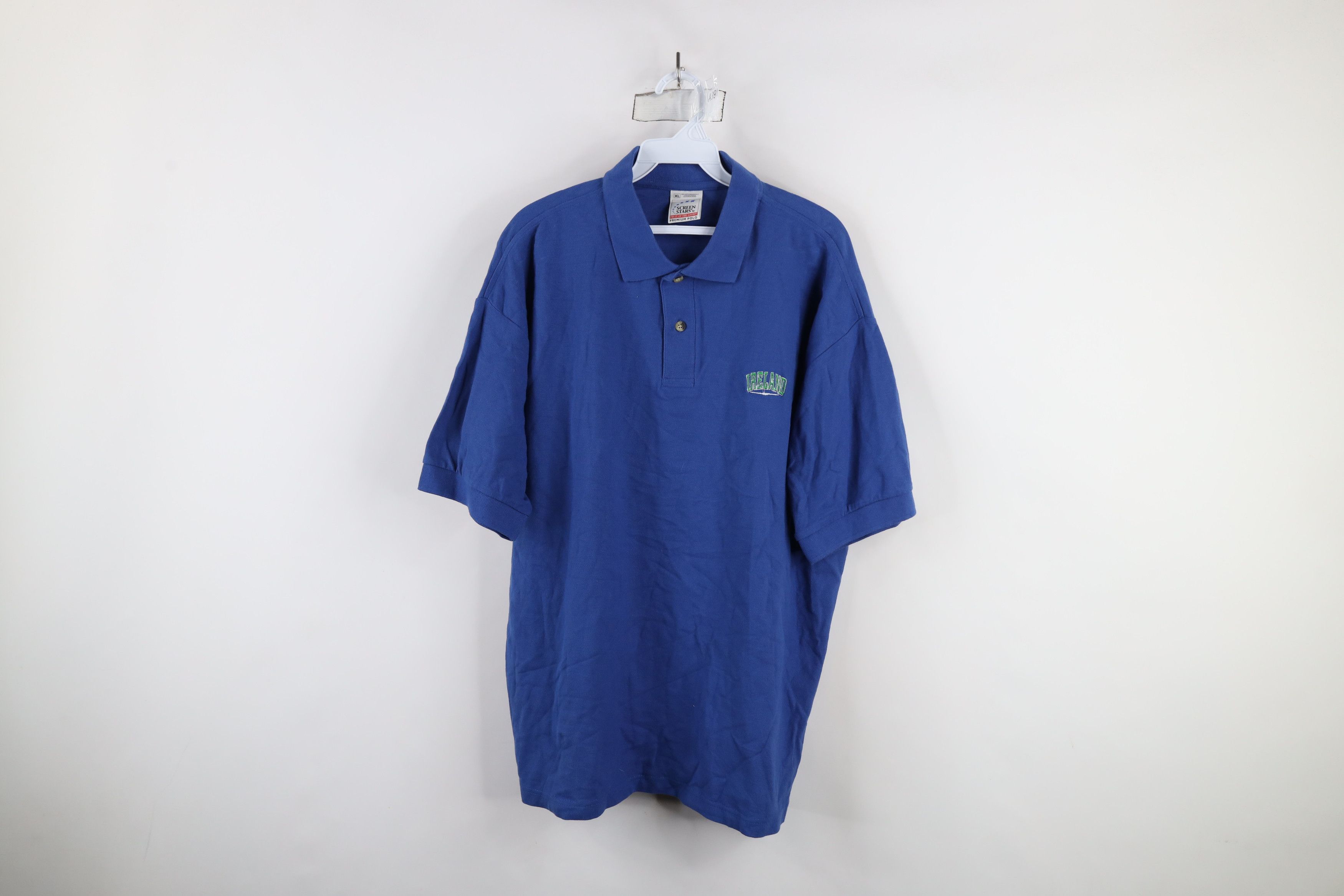 Vintage Vintage 90s Streetwear Out Ireland Collared Polo Shirt Blue Size US XL / EU 56 / 4 - 1 Thumbnail