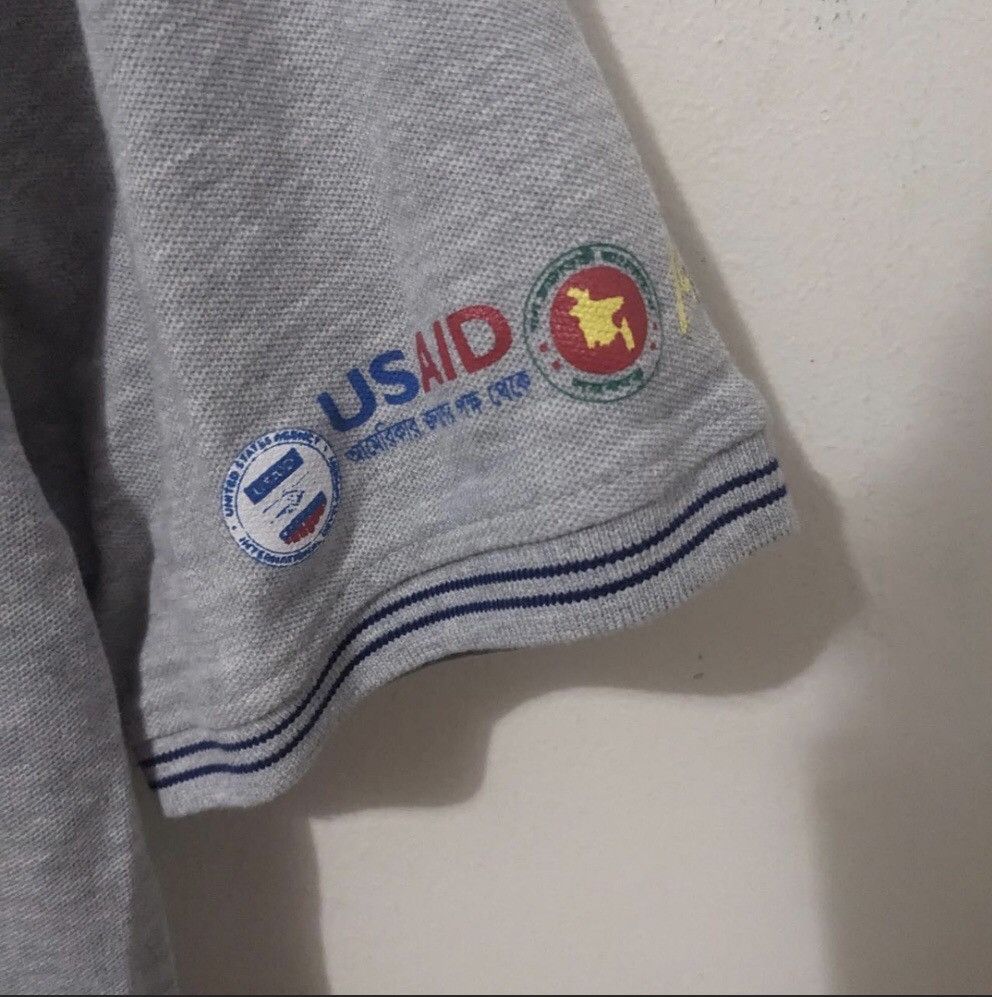 Other USAID DNET BANGLADESH 🇧🇩 COOL POLO avant-garde skater y2k Size US M / EU 48-50 / 2 - 5 Thumbnail