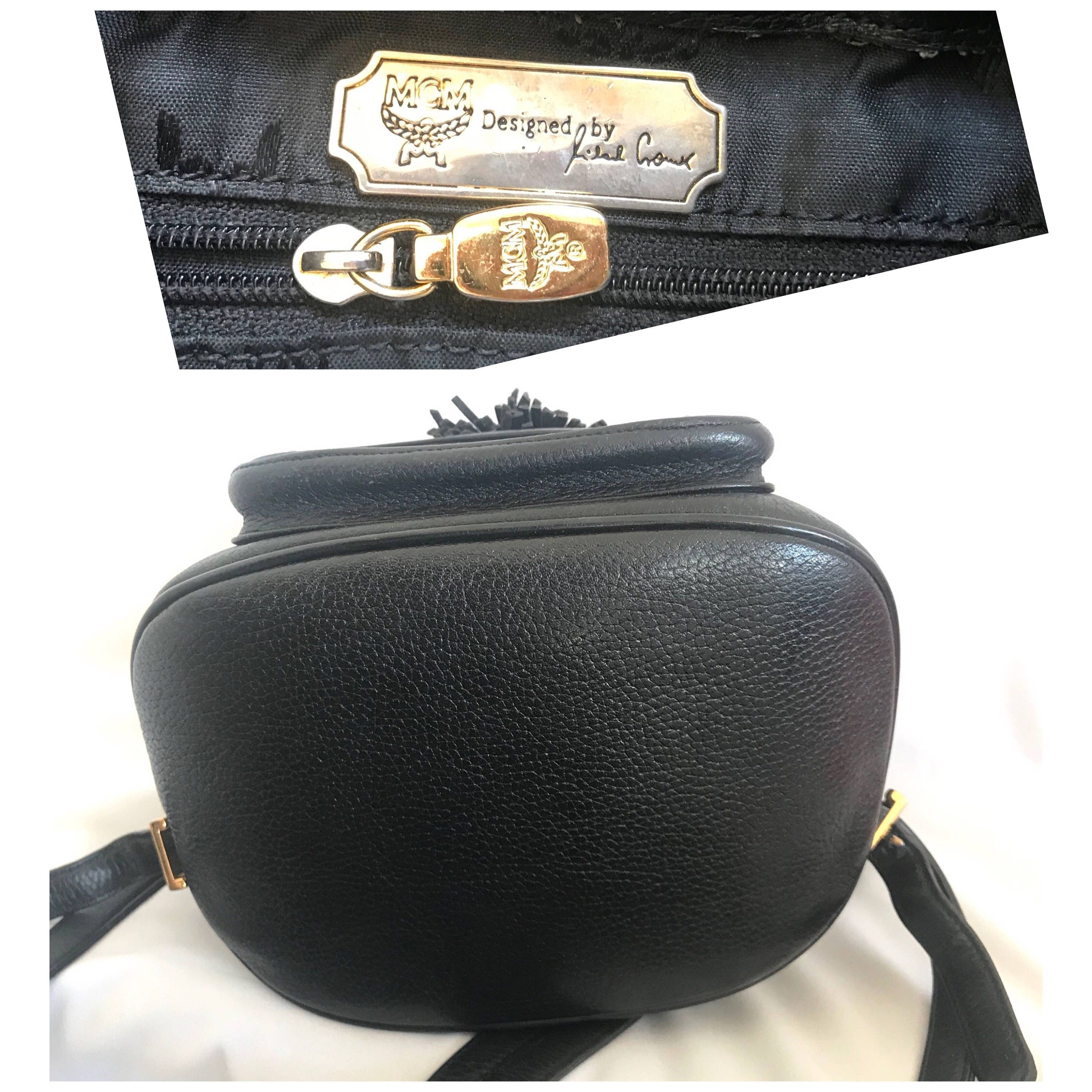 MCM Vintage MCM black backpack with golden studded logo motifs Size ONE SIZE - 8 Thumbnail