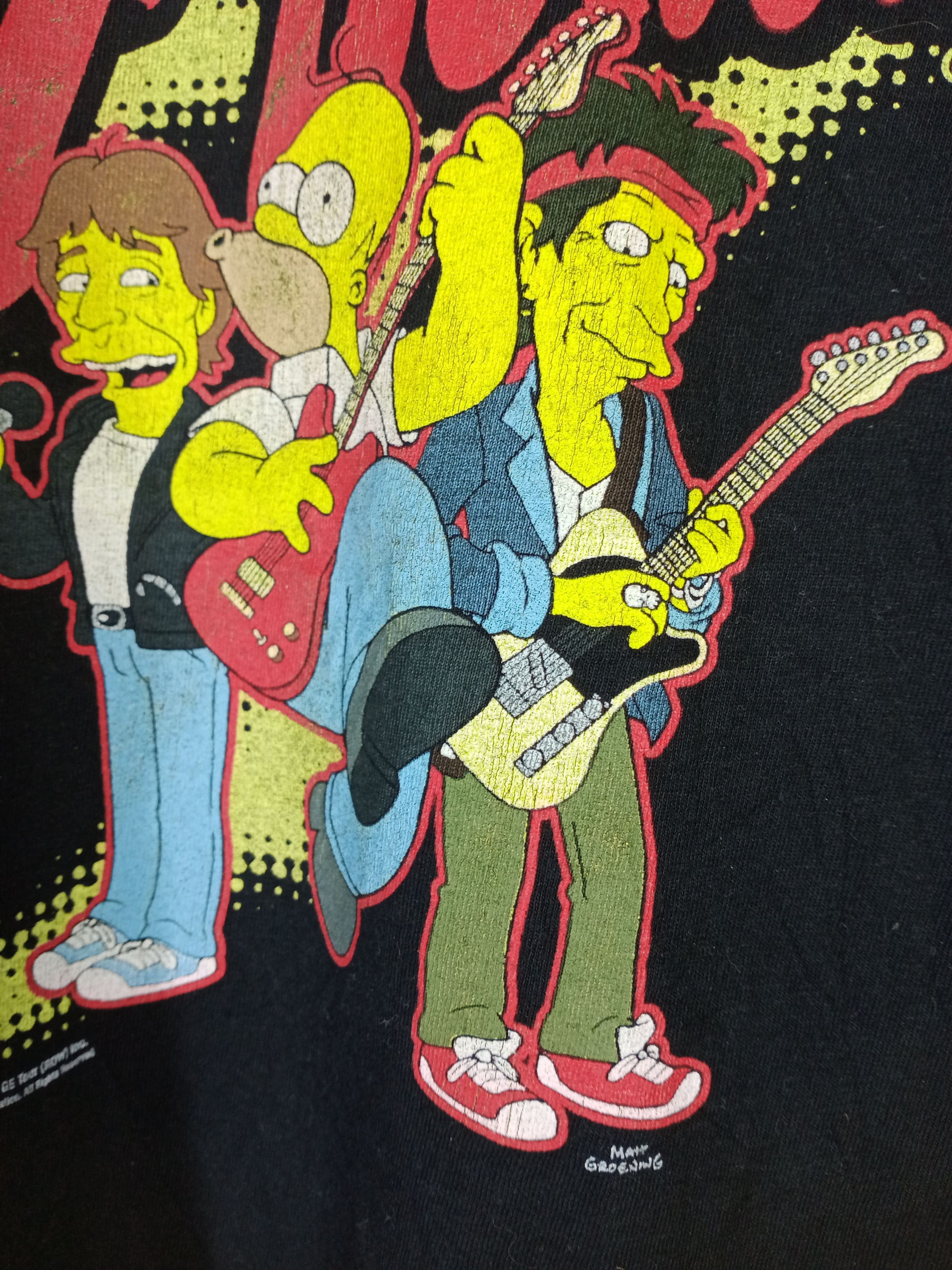 The Rolling Stones × The Simpsons × Vintage Vintage 2002 The Simpsons X Rolling Stones "Get Licked" Tee Size US L / EU 52-54 / 3 - 4 Thumbnail
