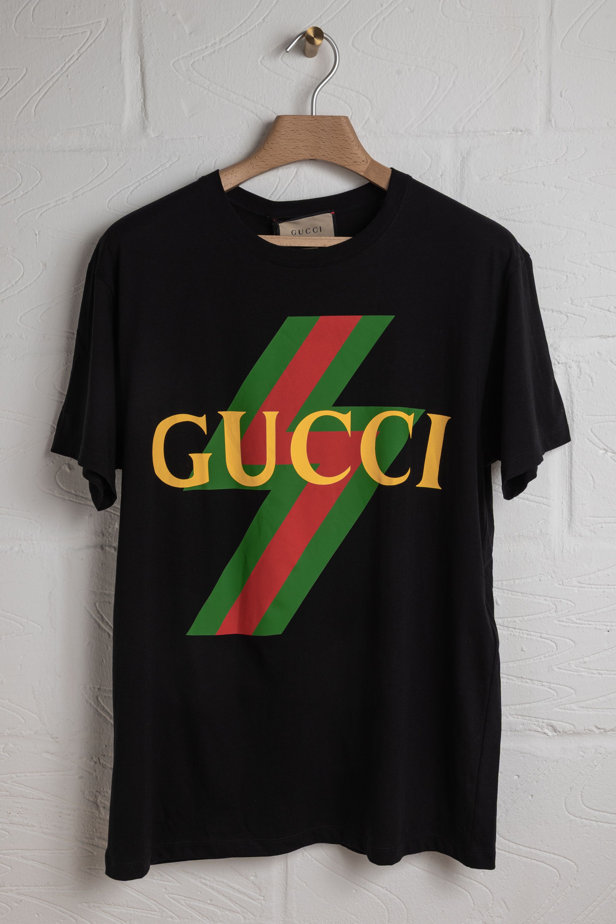 Gucci Guccy Sega Logo Black and Gold T-Shirt | Grailed
