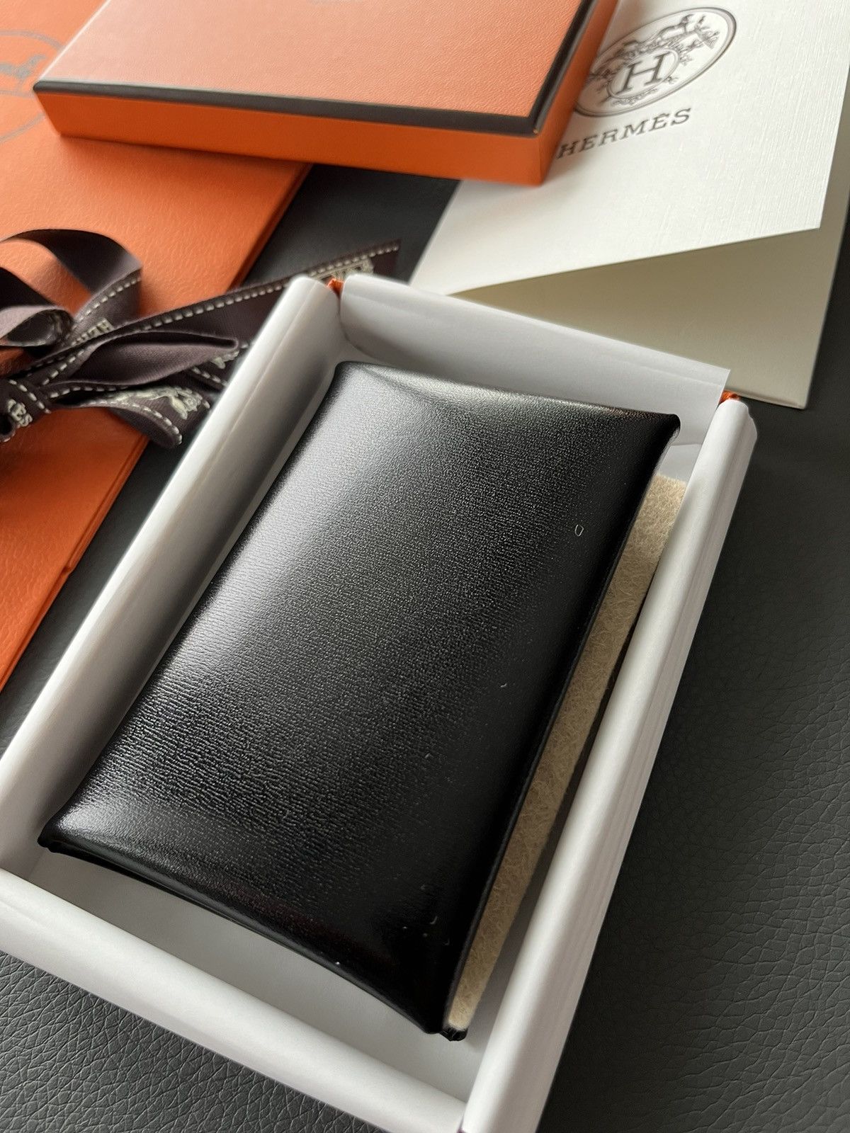 image of Hermes Extremely Box Leather Calvi Wallet in Black, Men's