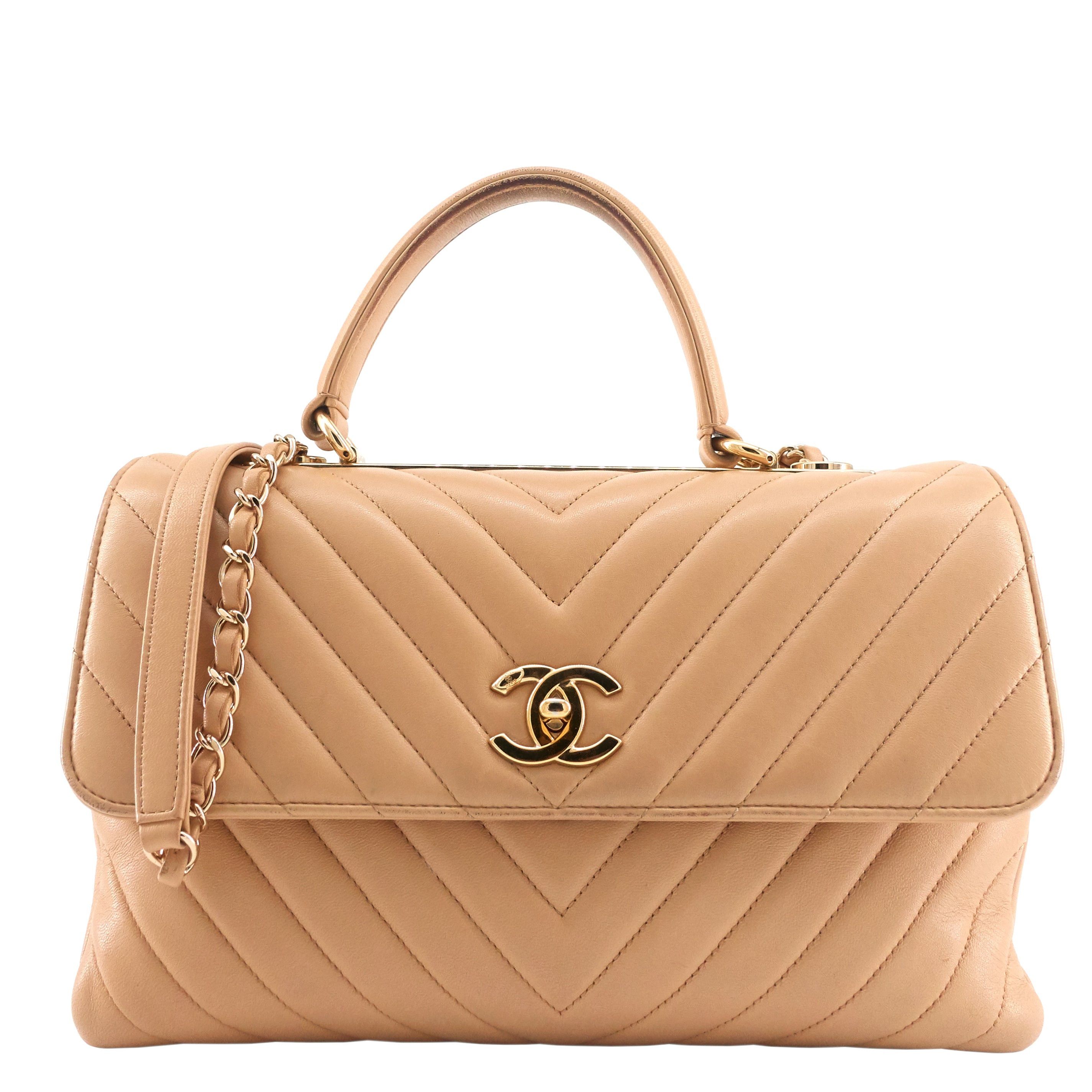 image of Chanel Trendy Cc Chevron Medium Top Handle Leather Bag in White, Women's