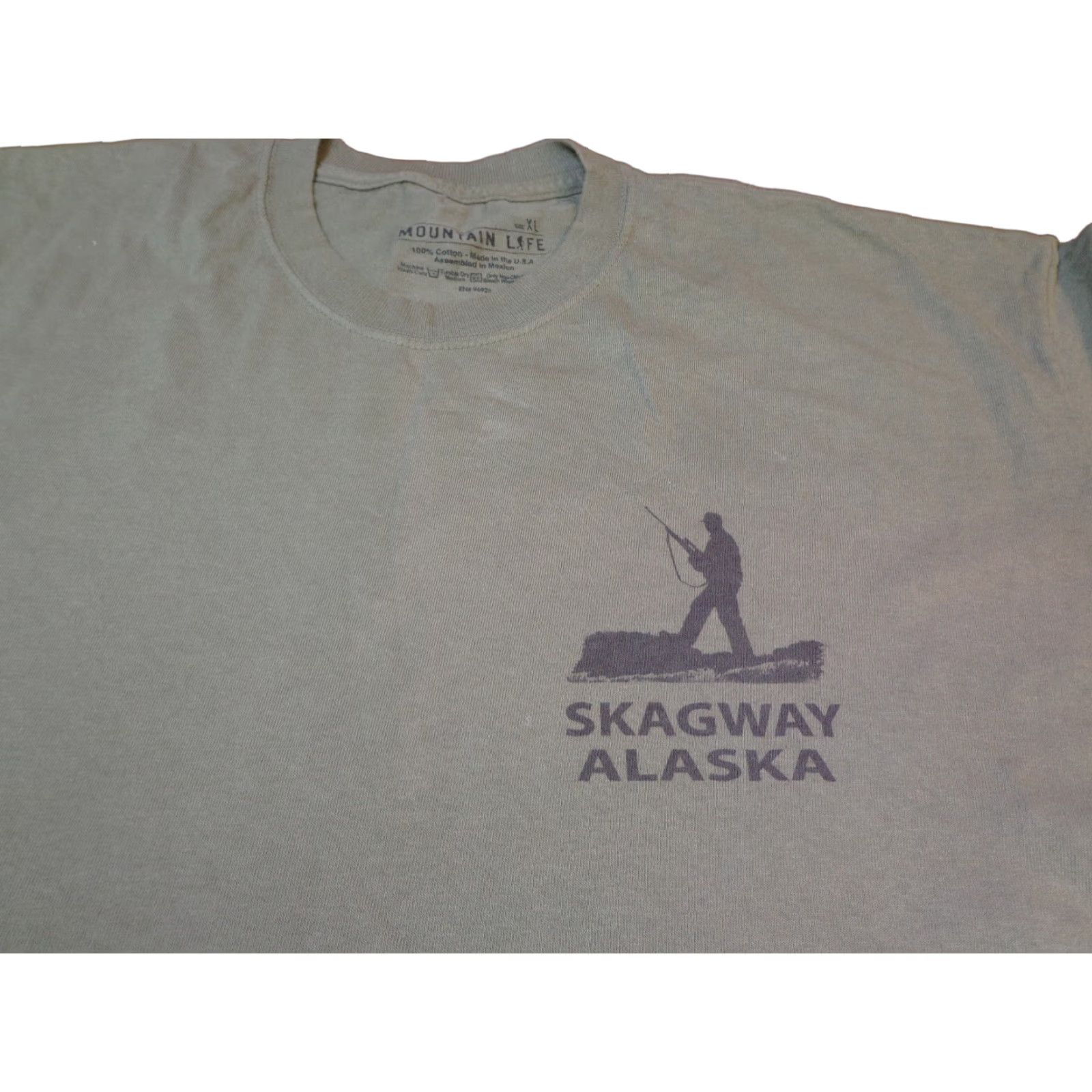 The Mountain The Mountain Mountain Life Skagway Alaska Hunting XL Green T-Shirt Mens Graphic Tee Short Sleeve 100% Cotton Regular Size XL Size US XL / EU 56 / 4 - 1 Thumbnail