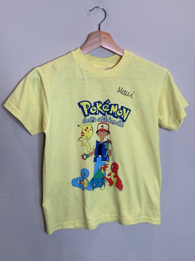 image of Pokemon Pokémon Ash Pikachu Baby Tee “Gotta Catch Em’ All” Maui in Yellow, Women's (Size Small)