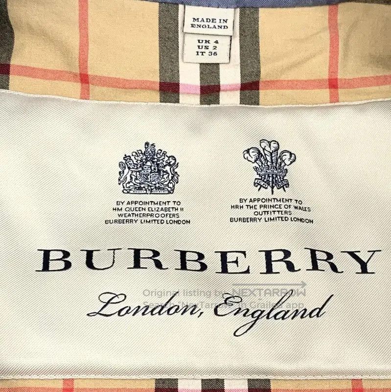 Burberry Women's Dark Blue Cotton Trench Coat.