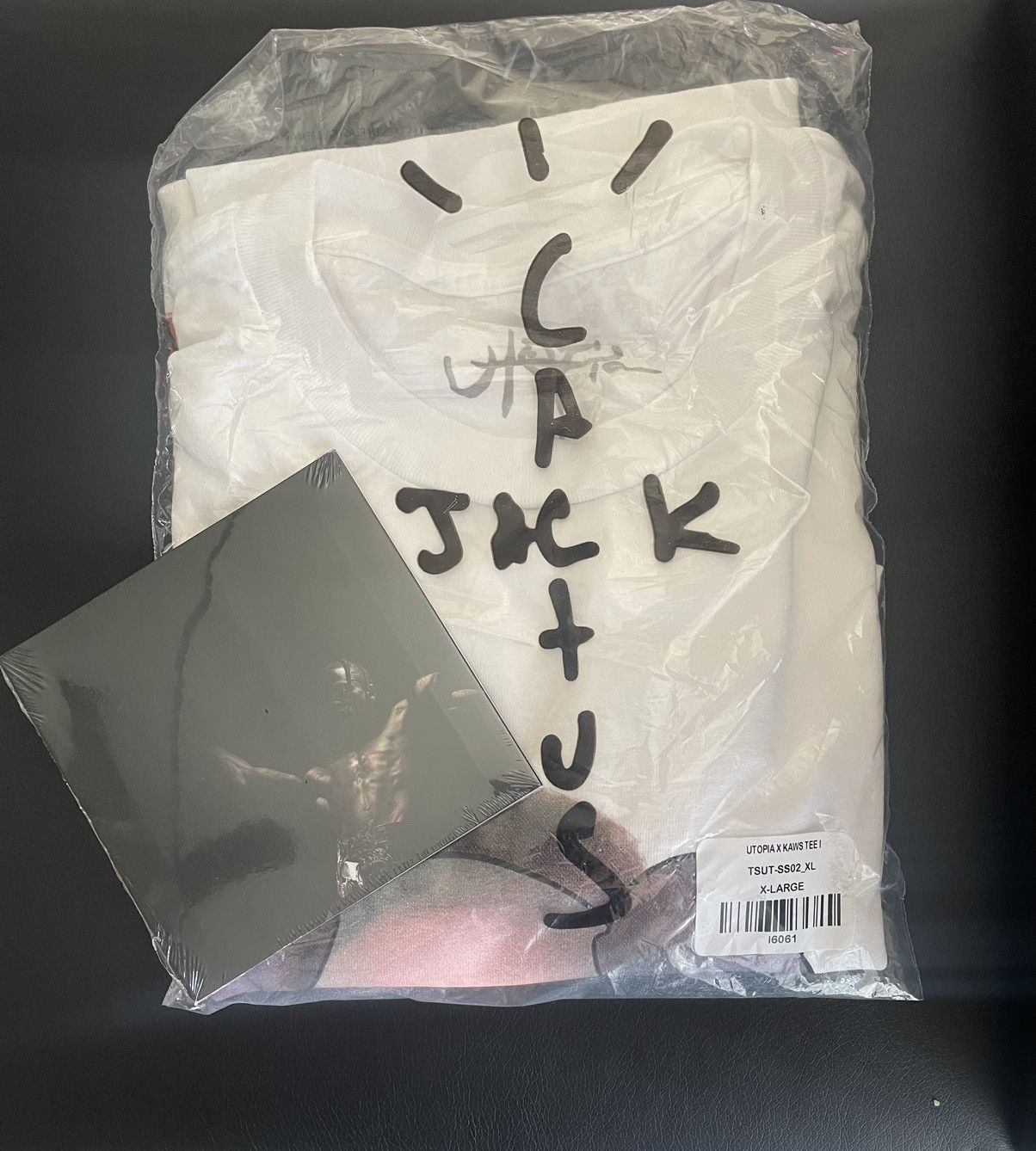 travis scott kaws tee