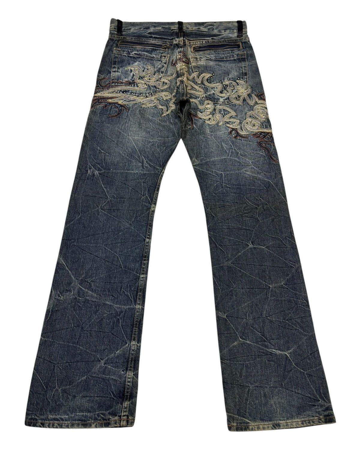 Tornado Mart 2000s Tornado Mart Tribal Flared Jeans | Grailed