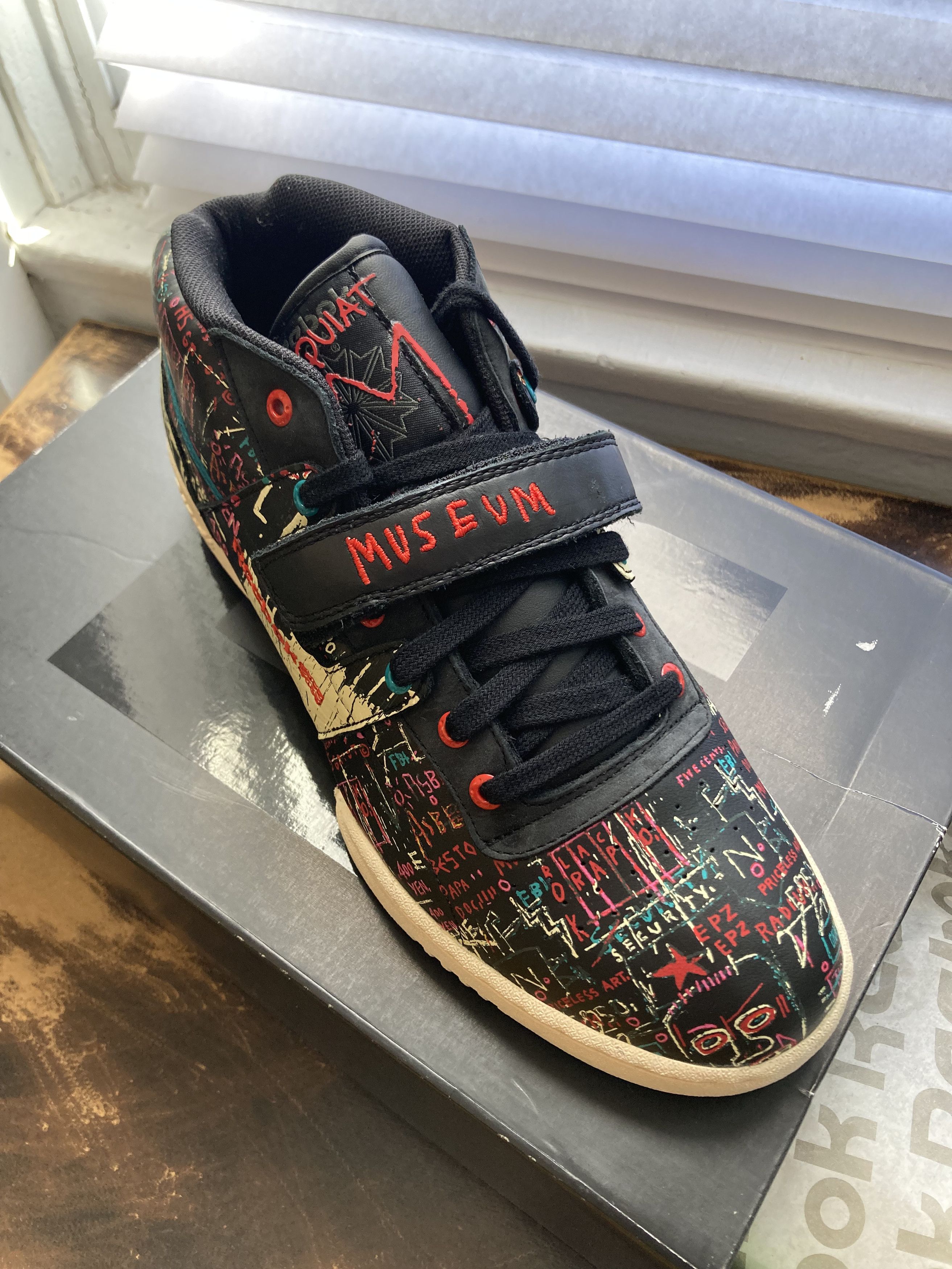 image of Jean Michel Basquiat x Reebok Basquiat Workout Mid Strap Int Bsq Shoes in Black, Men's (Size 9)