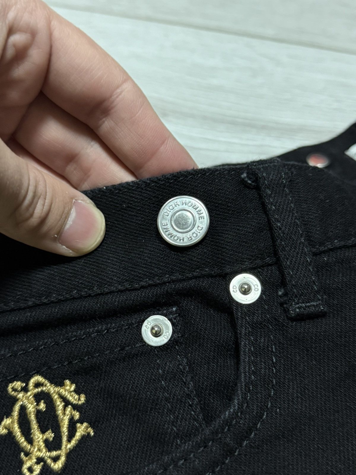 Dior × Kaws Dior x Kaws bugs slim jeans pants all over buttons Size US 33 - 6 Thumbnail