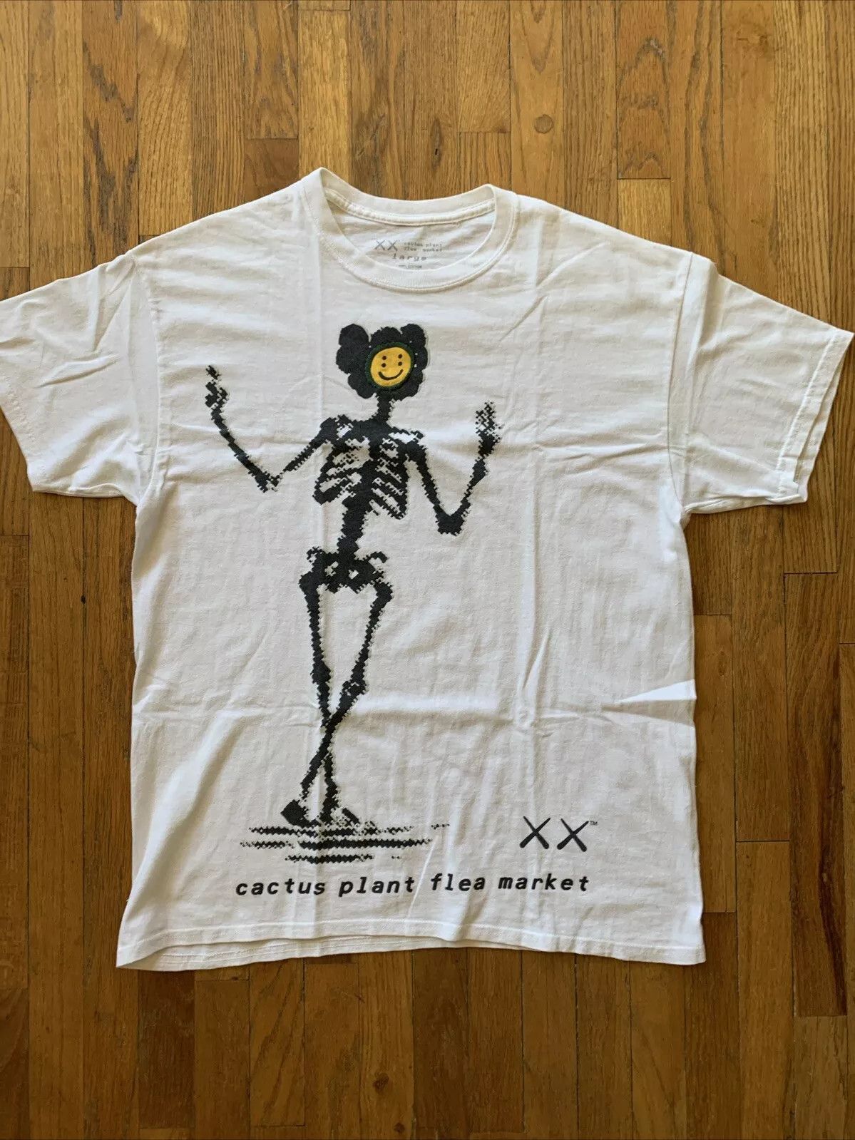 KAWS x Cactus Plant Flea Market T-Shirt - www.disolcolor.com