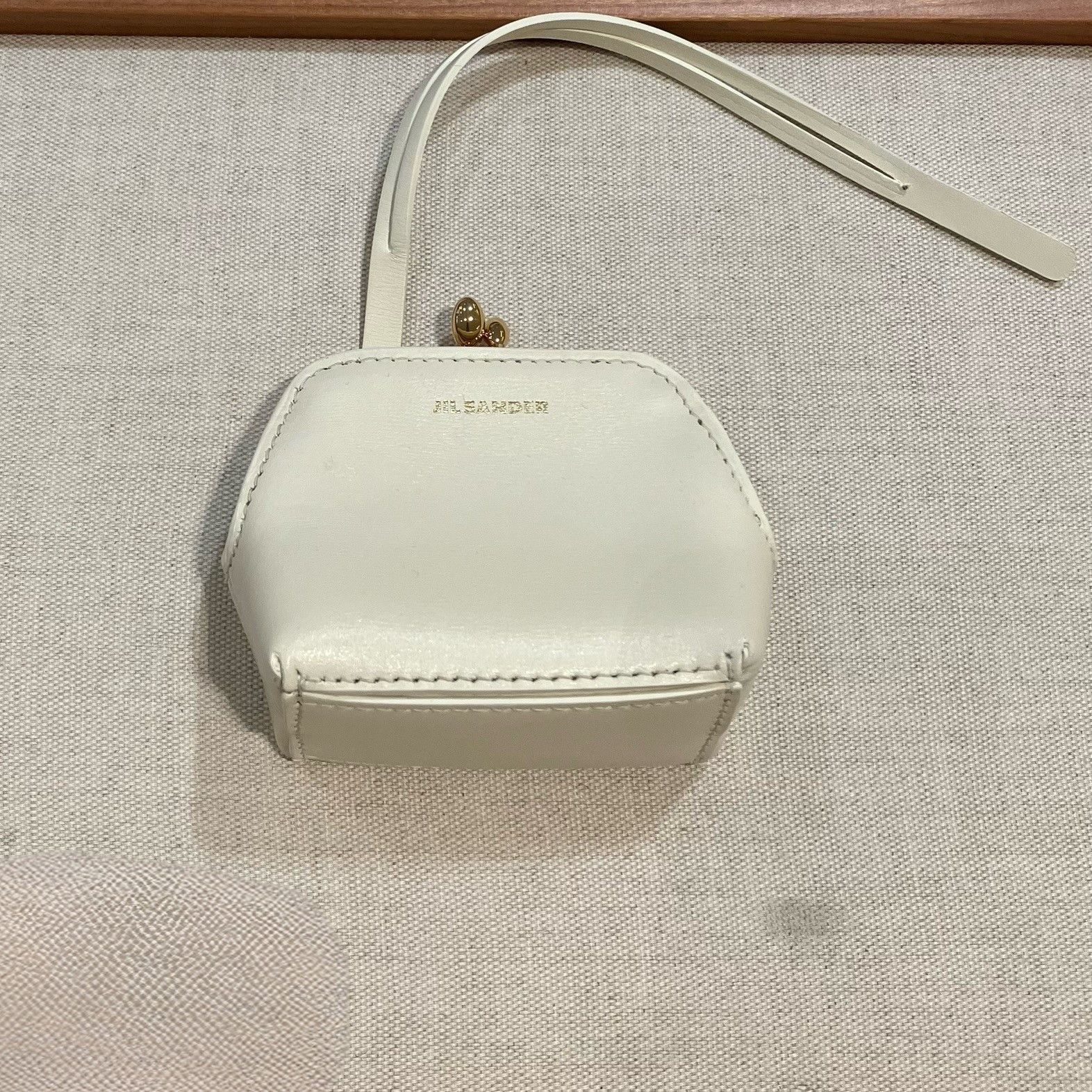 Jil Sander o1loc1c1124 Size: OS/ Goji Logo Leather Pouch in White Size ONE SIZE - 1 Preview