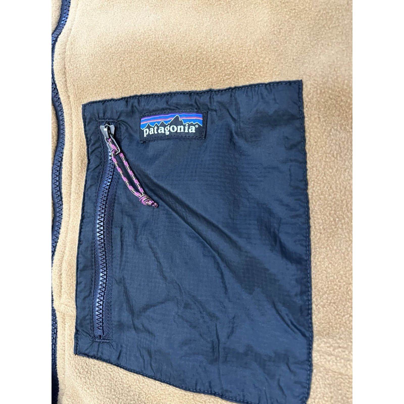 Patagonia Patagonia Reversible Jacket Men Navy Tan XXL Nylon Fleece Zip Zipper Logo Stand Collar Outdoor Casual Long Sleeve Mid-Length 2XL Blue Size US XXL / EU 58 / 5 - 7 Thumbnail