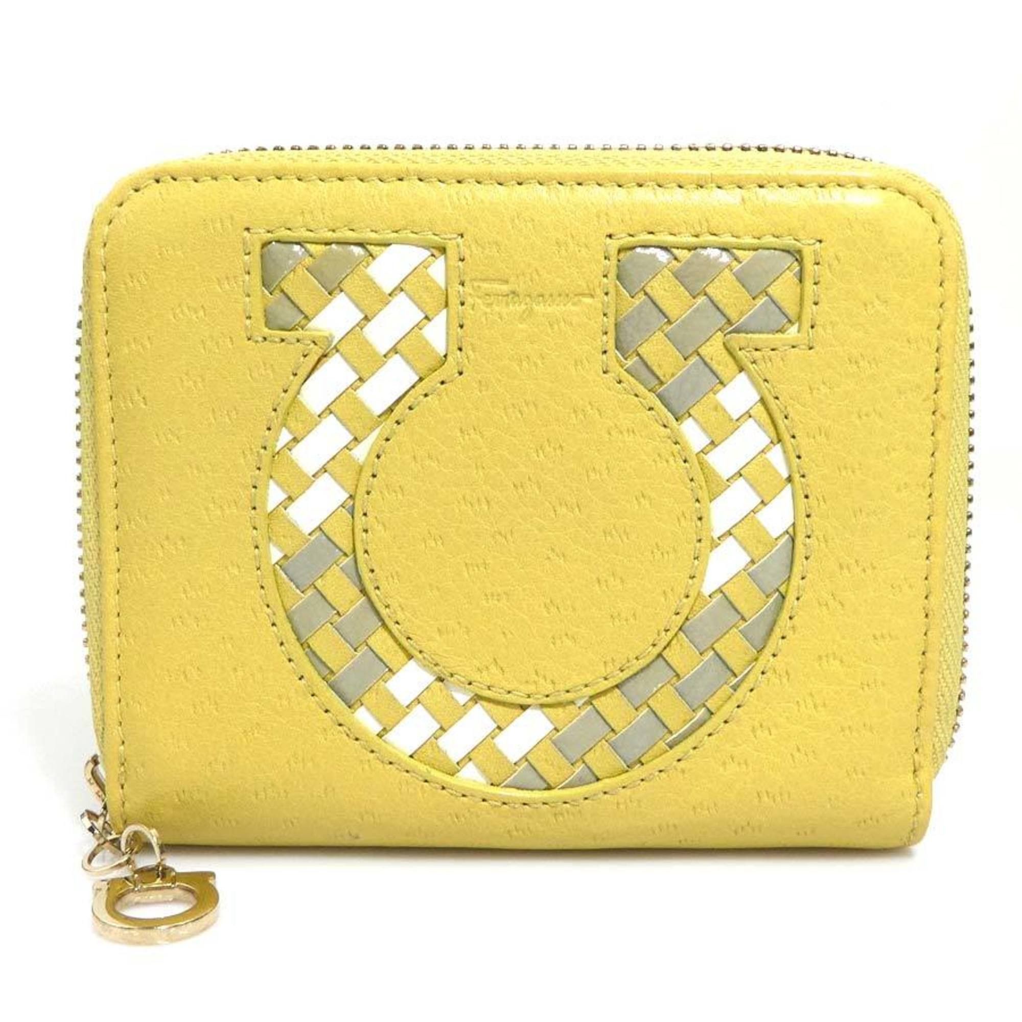 Salvatore Ferragamo Salvatore Ferragamo Gancini Leather Bi-fold Wallet in Mustard Yellow for Women (h31855a) Size ONE SIZE - 1 Thumbnail