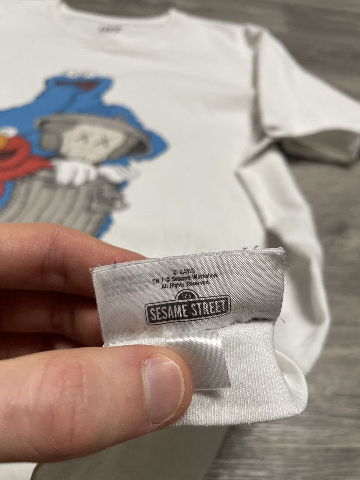 Kaws × Uniqlo KAWS X UNIQLO X SESAME STREET COMPANION TRASH CAN WHITE TEE Size US L / EU 52-54 / 3 - 12 Thumbnail