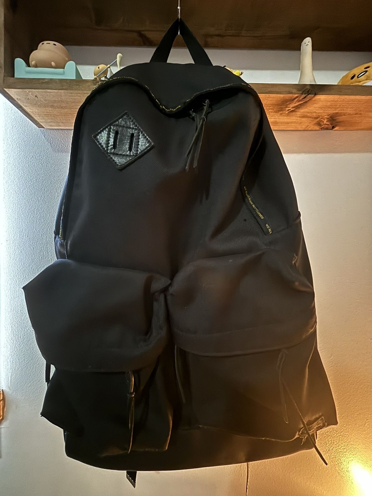 image of Undercover "we Make Noise Not Clothes" Bag in Black, Men's