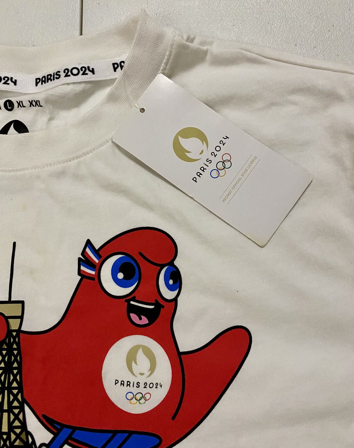 Other Paris Olympics 2024 Eiffel Tower Phryge Mascot Official Tee Size US L / EU 52-54 / 3 - 7 Thumbnail