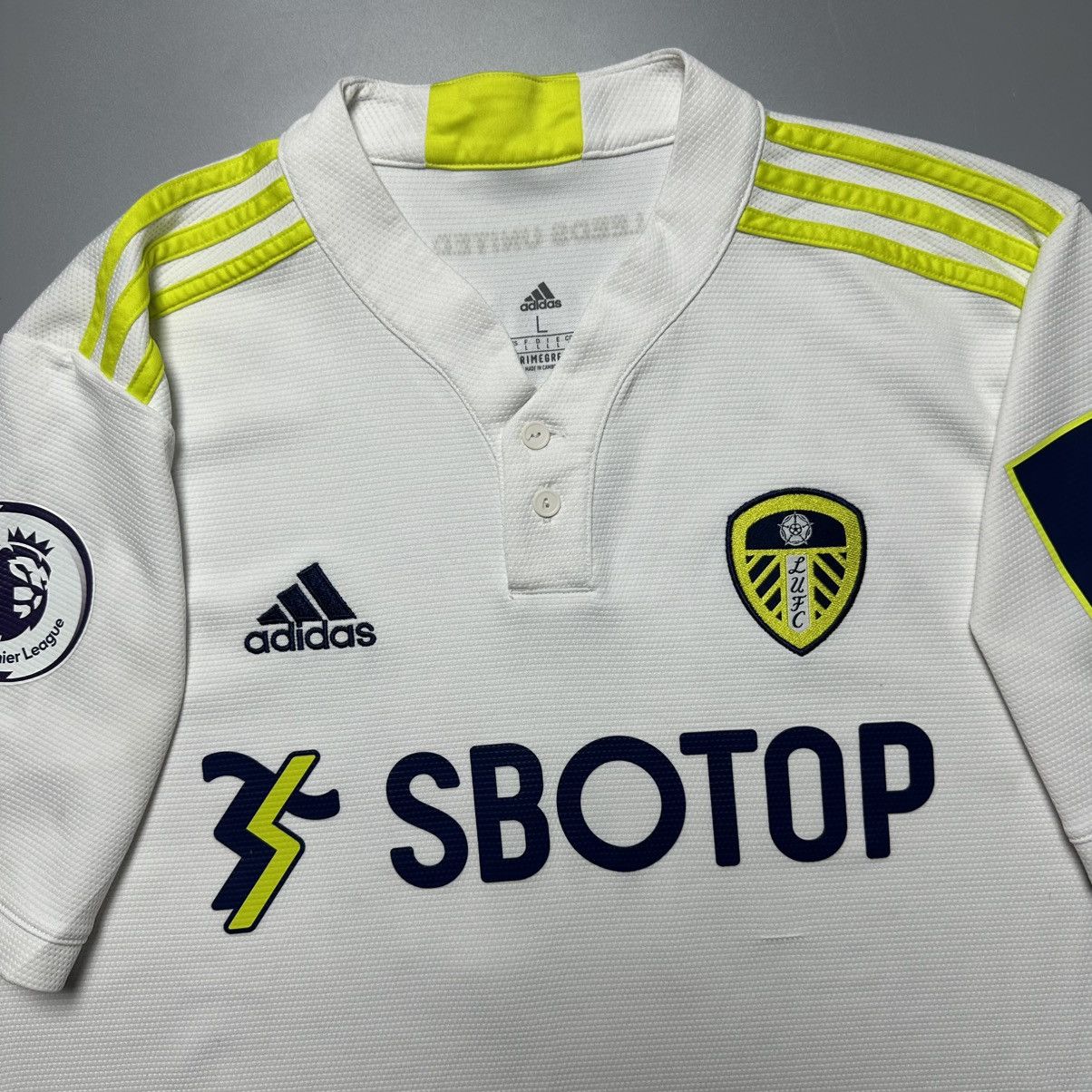 Adidas LEEDS UNITED ADIDAS 2021/2022 FOOTBALL JERSEY #18 RAPHINHA Size US L / EU 52-54 / 3 - 4 Thumbnail