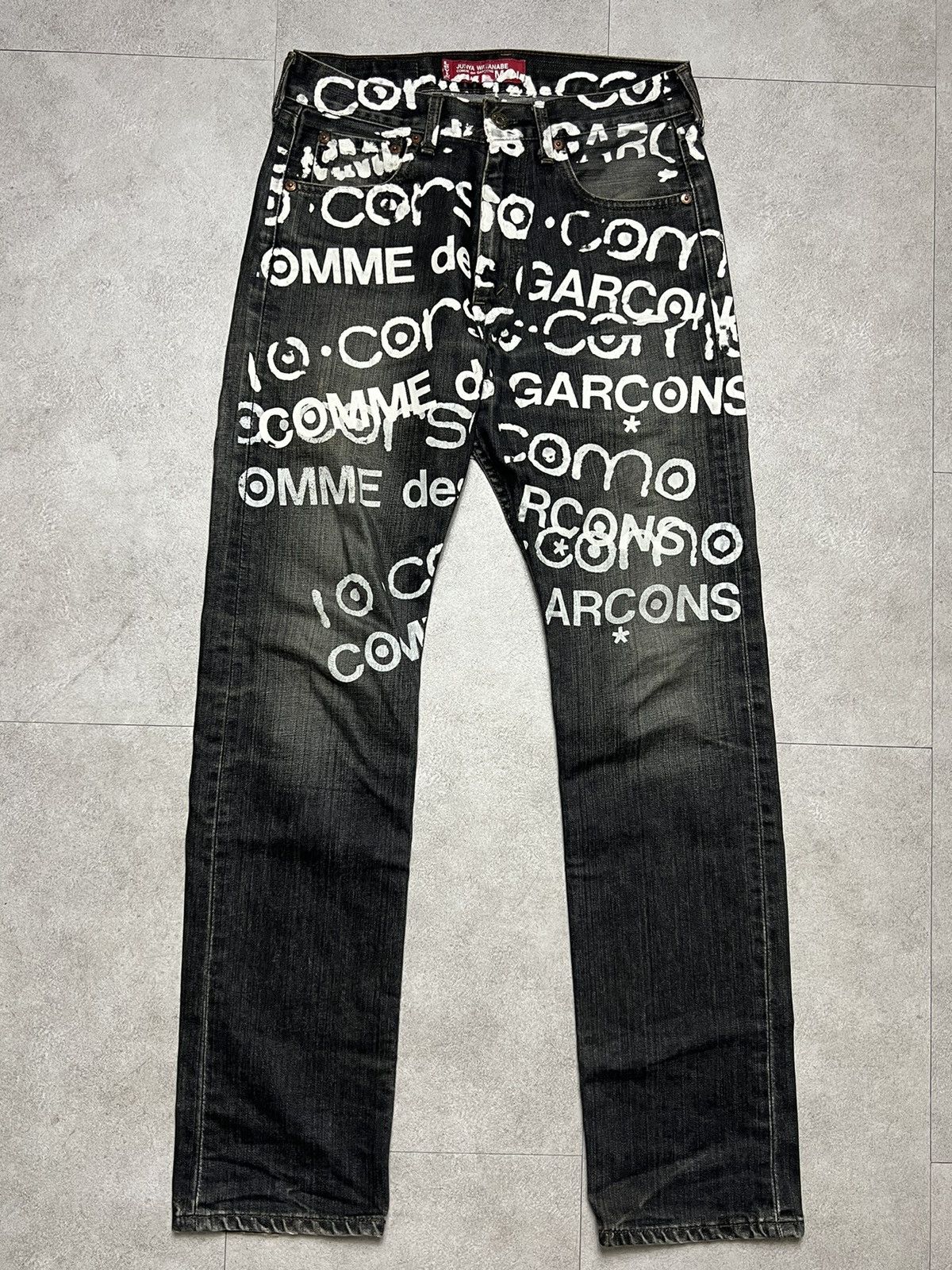 image of 10 Corso Como x Comme Des Garcons Comme Des Garçons Junya Watanabe Corso Como Painted Jeans in Blac