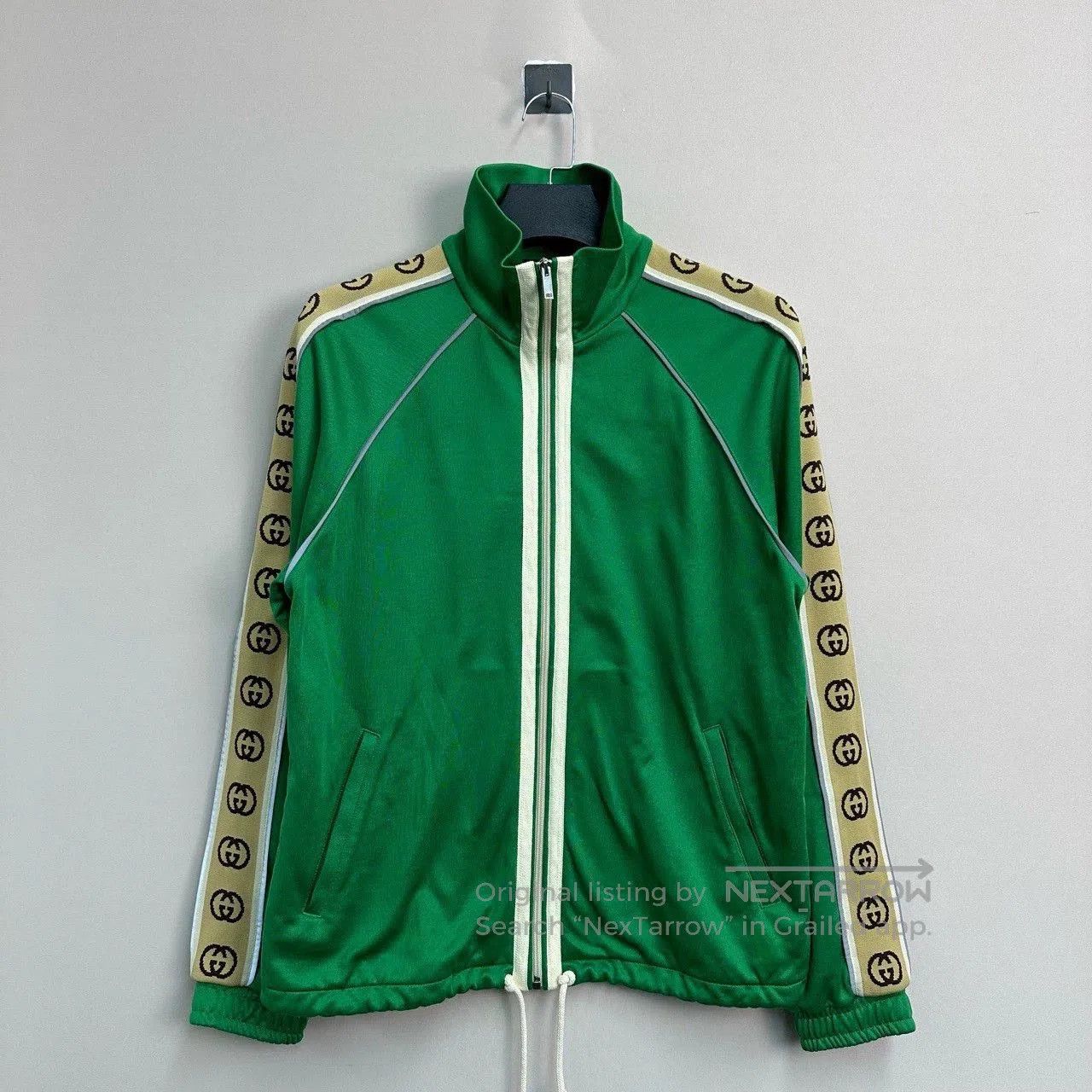 gucci reflective zip jacket in vibrant green.