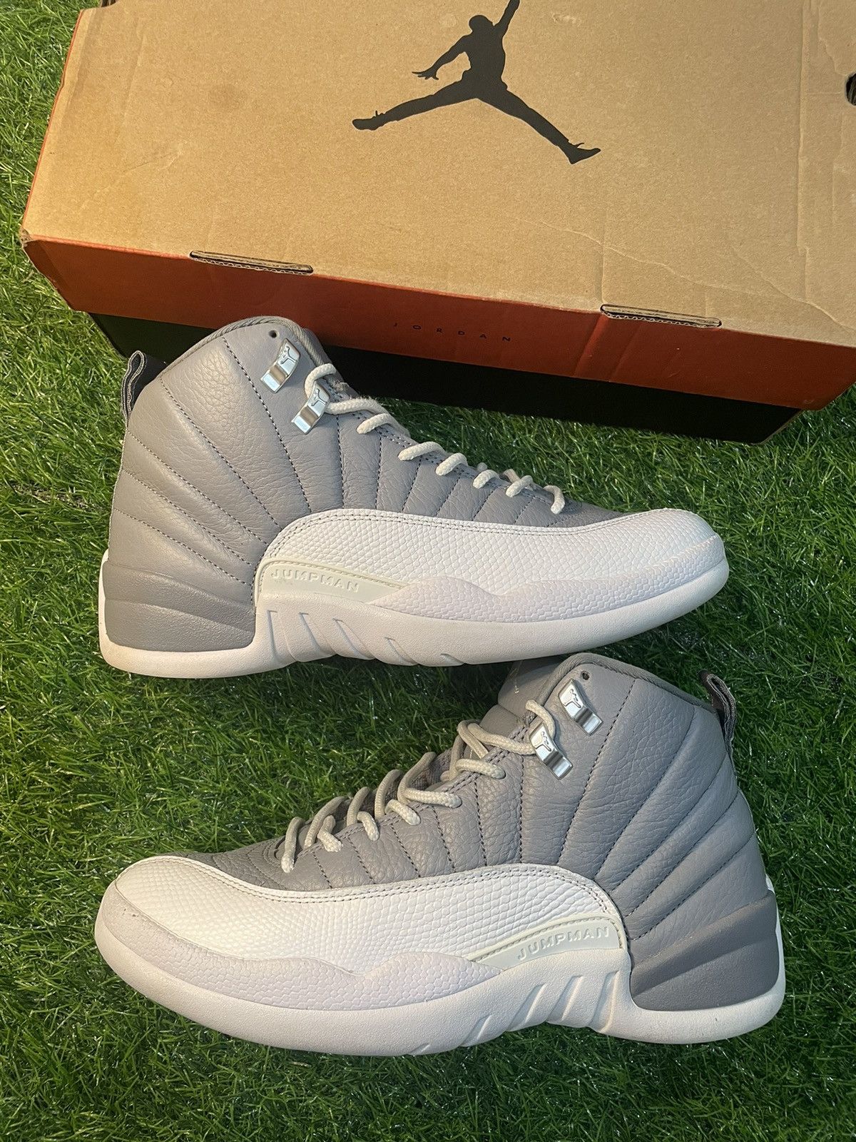 image of Jordan Brand 12 Stealth Shoes in Gray/White, Men's (Size 9)