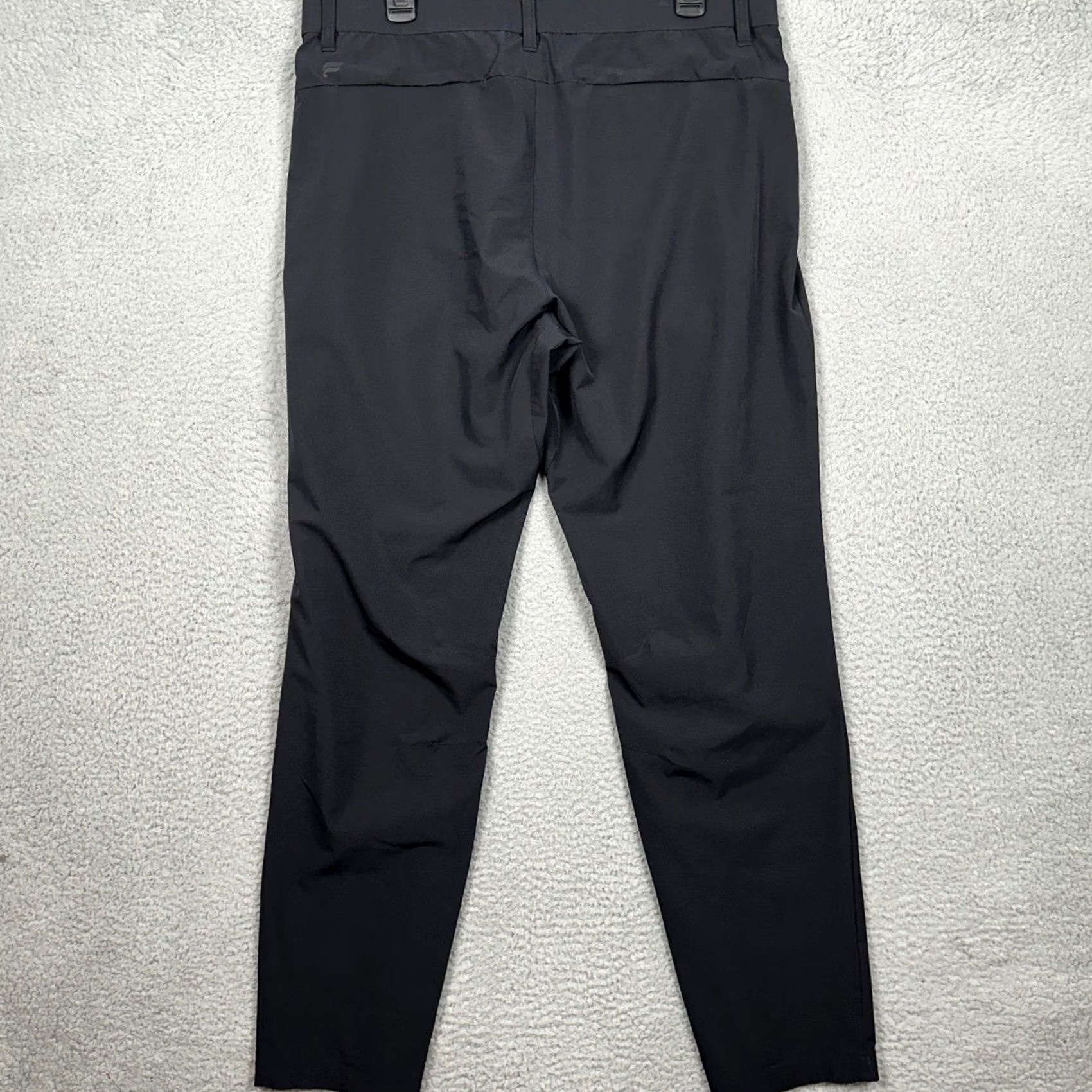 Fabletics Fabletics The One Pant Pants Mens 35x34 Black Tapered Leg Stretch EUC Golf Tech Moisture-Wicking Zip Pocket Athletic Chino Casual Workwear Size US 35 - 2 Thumbnail