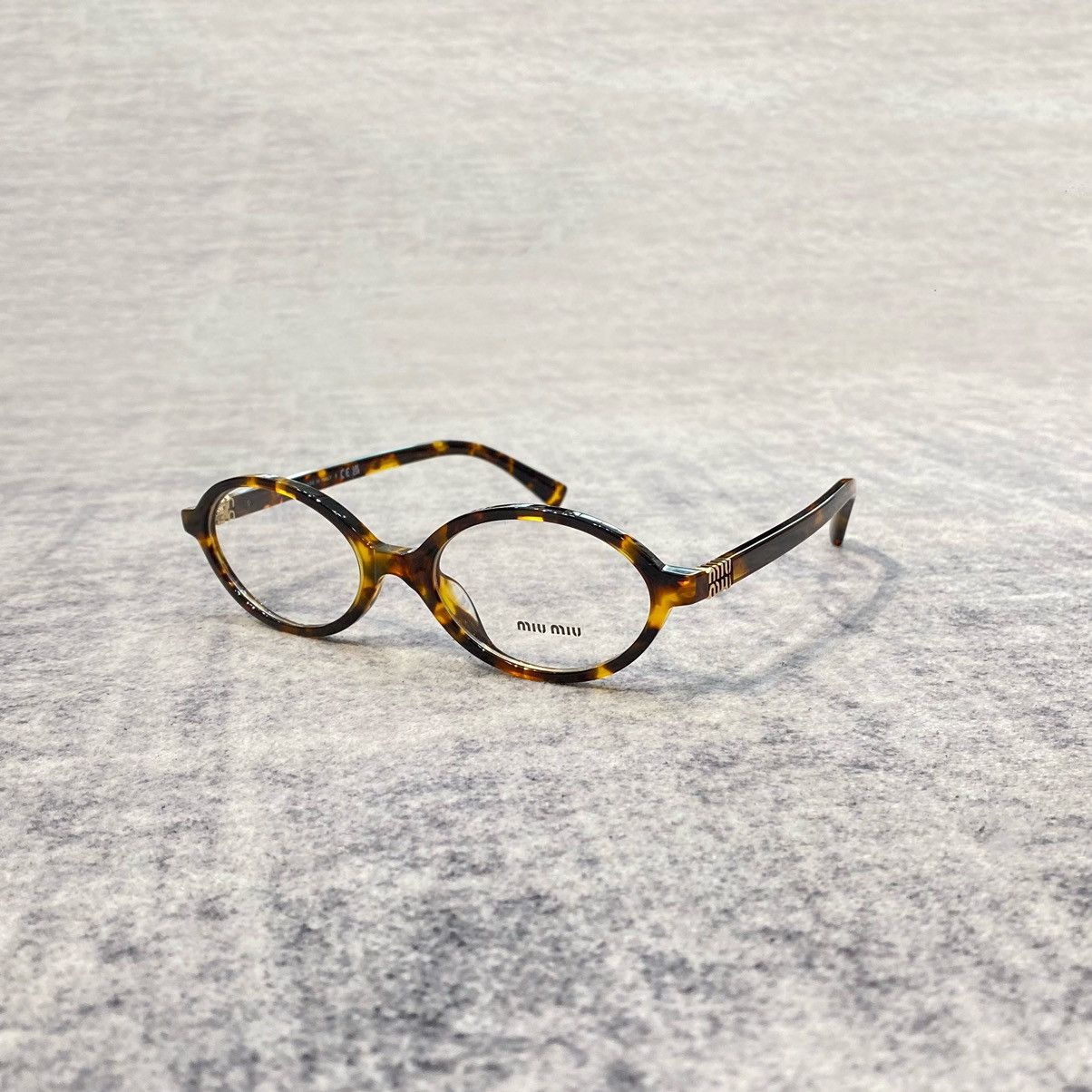 Miu Miu MIU MIU 0MU 01XV VAU1O1 HONEY HAVANA Size ONE SIZE - 1 Thumbnail