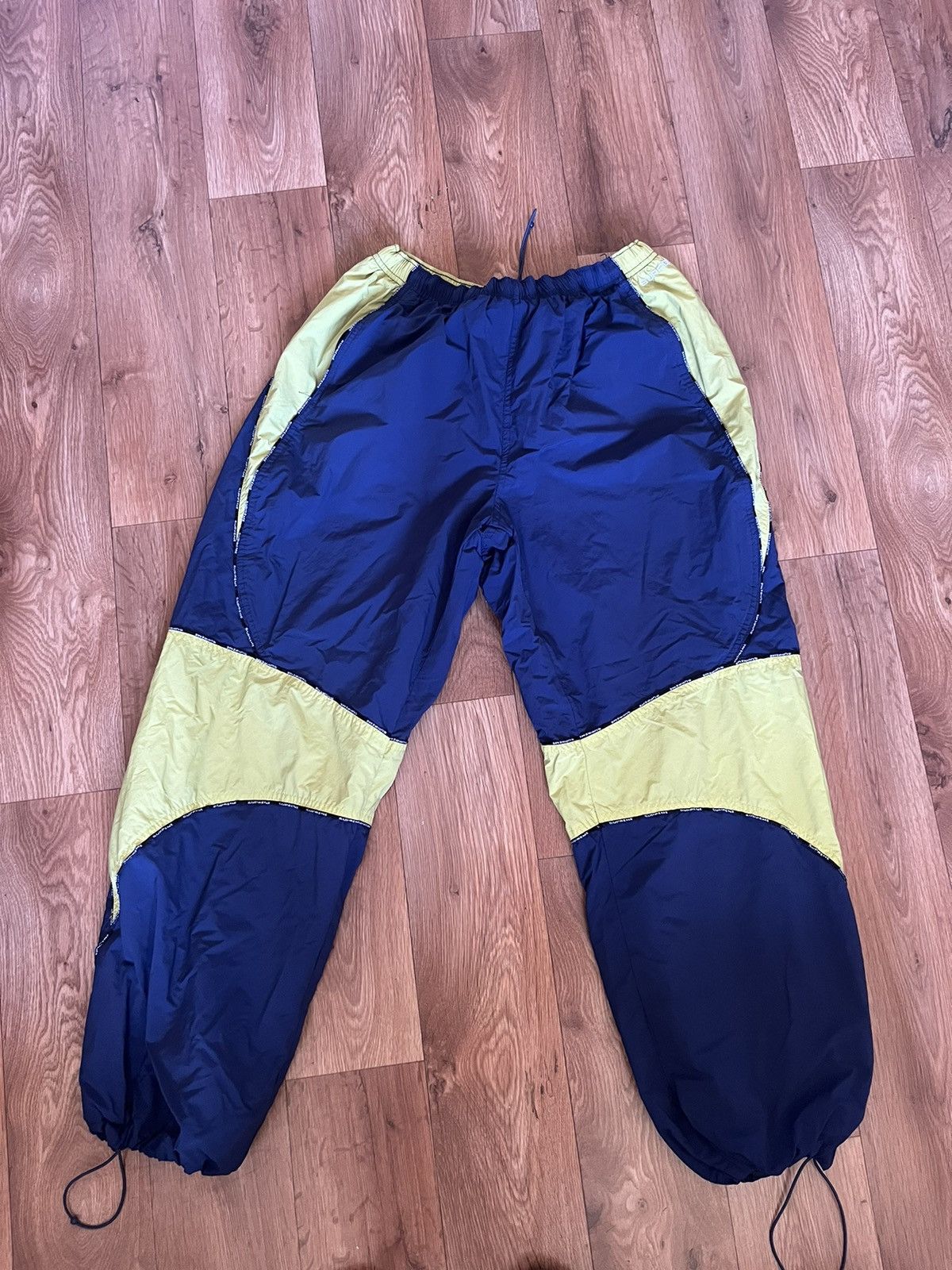 image of Supreme Logo Piping Trackpants in Blue, Men's (Size 33)