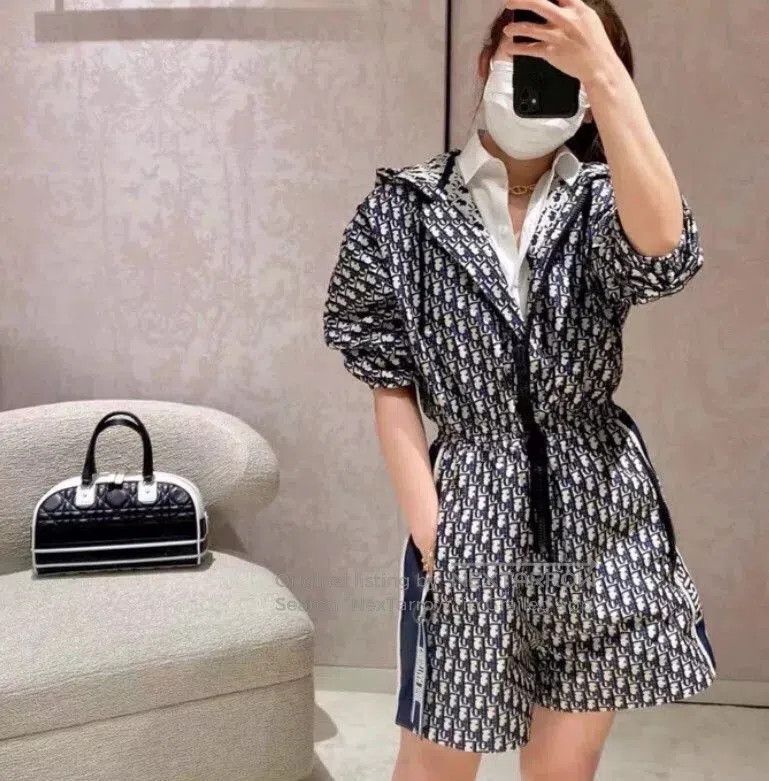dior color logo hoodie jumpsuit with drawstring.