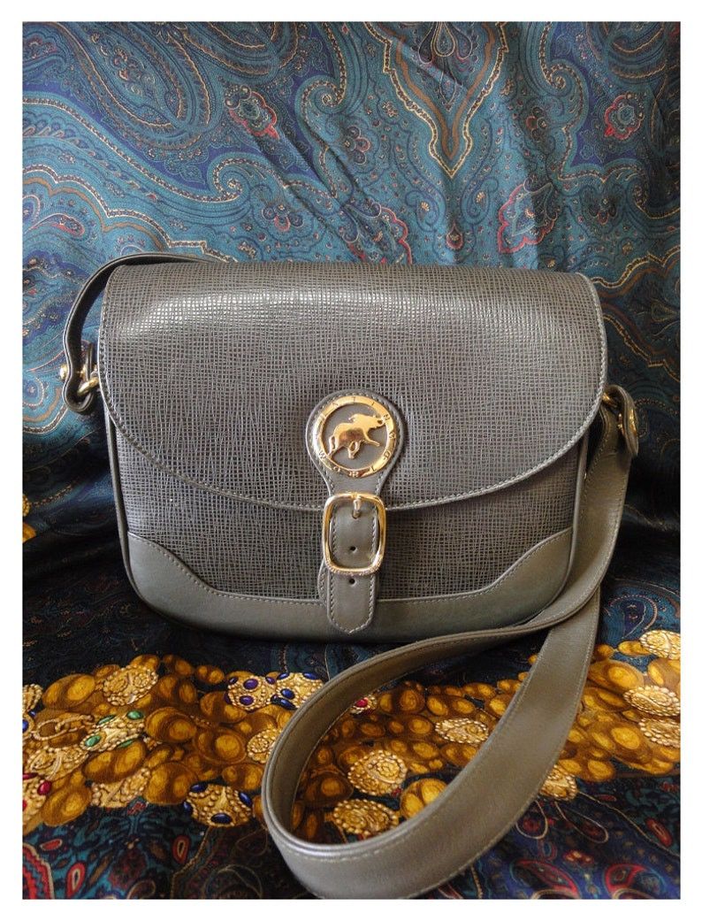 image of Vintage Hunting World Khaki Genuine Leather Shoulder Purse With Iconic Gold Tone Elephant Logo Char