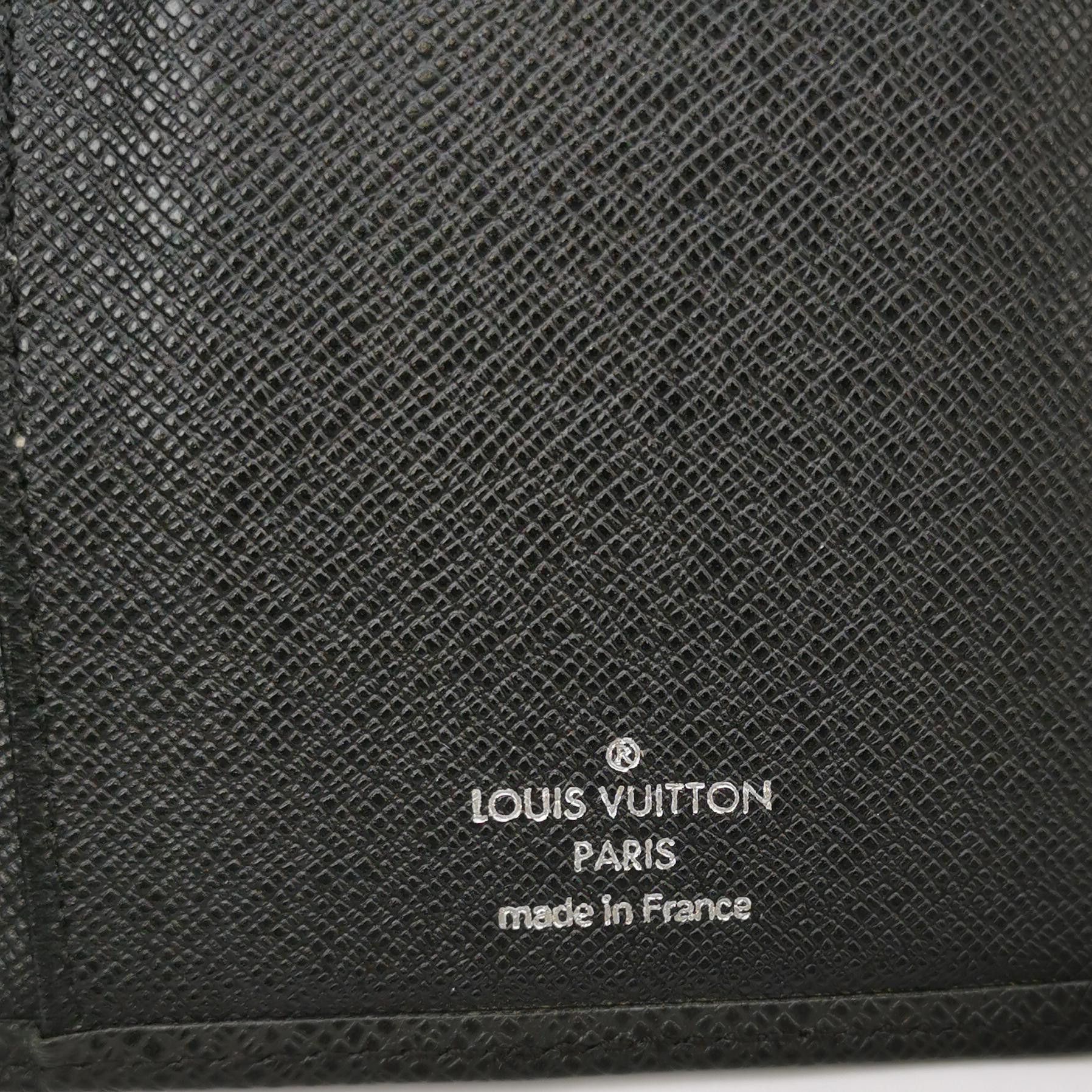 Louis Vuitton Louis Vuitton (LV) Brazza leather solid color bi-fold walle Size ONE SIZE - 1 Thumbnail